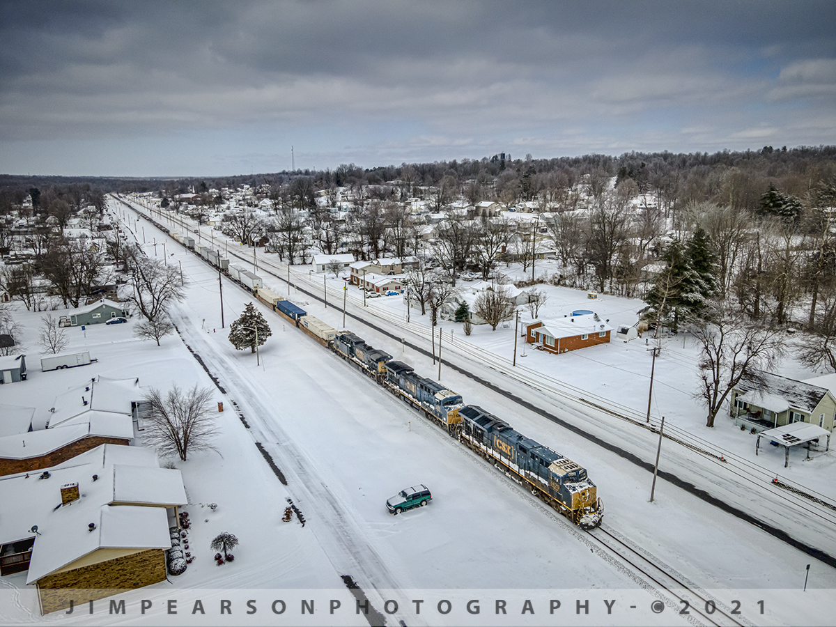 An almost empty CSX Q025 southbound through the snow!

February 16th, 2021 was another frigid, snowy, cold winter day,  which is pretty much normal this week with the artic cold we've been having all around the country! When I launched my Air 2 drone for this shot of CSX Q025 heading south through Earlington, Kentucky on the Henderson Subdivision I didn't expect what showed up!

What made this move even more different is that it only had 13 loads behind the power and everything else on the train was empties! Looks like the cold and freezing weather up north has put a damper of the cargo loading operations and so it's reflected in the almost empty hot intermodal heading for Jacksonville, Florida.

Tech Info: DJI Mavic Air 2 Drone, RAW, 4.5mm (24mm equivalent lens) f/2.8, 1/1600, ISO 100.