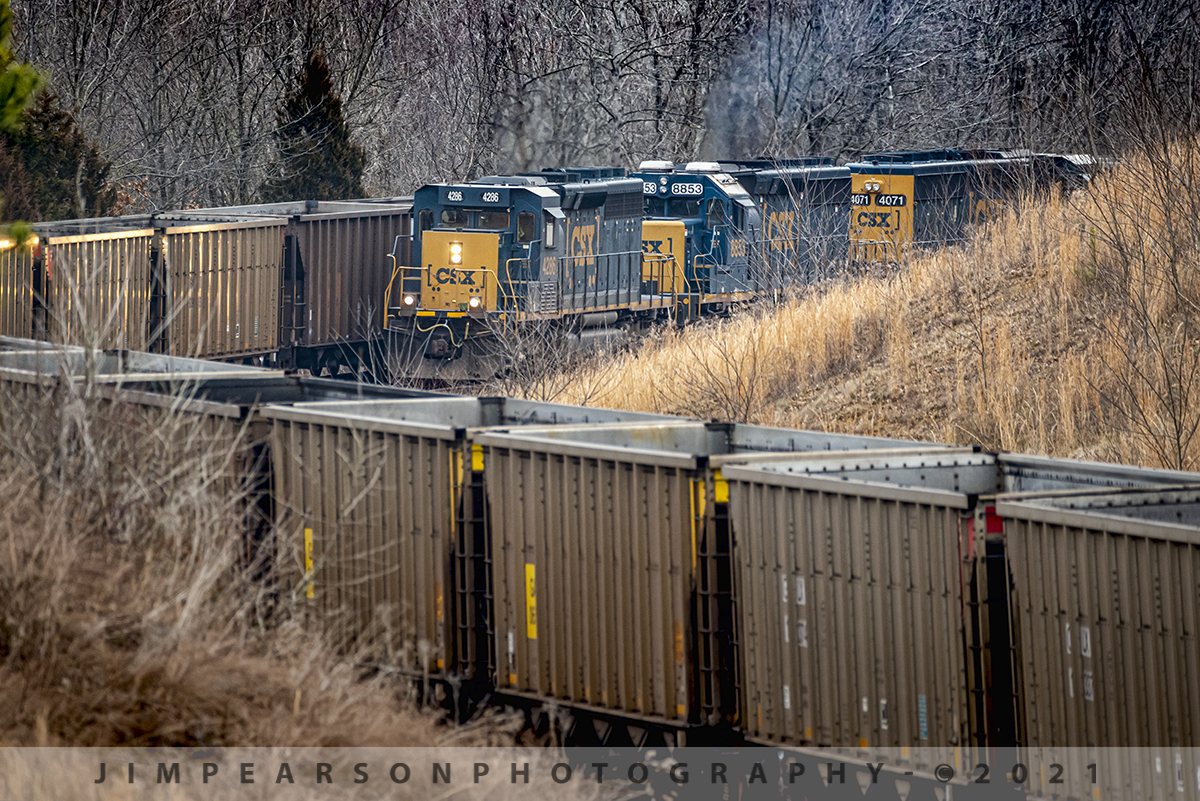CSX trains passing in the curve on the Henderson Subdivision

CSX local J732 with a trio of SD40's makes it's way past the empties at Nortonville, Ky as they both work their way through the S curve at Nortonville, Kentucky on the Henderson Subdivision on January 30th, 2021. 

This is a prime example of why I love long lenses, like my Sigma 150-600mm which was used for this shot! There's no other way to get this shot, with the compression and in your face type of photography. It really adds impact to the image and allows an image that you just can't get without a long lens! When out shooting your pictures always look for unique and different angles and shots to help add impact to your pictures!

Tech Info: Nikon D800, RAW, Sigma 150-600 @ 460mm, f/6, 1/800, ISO 800.