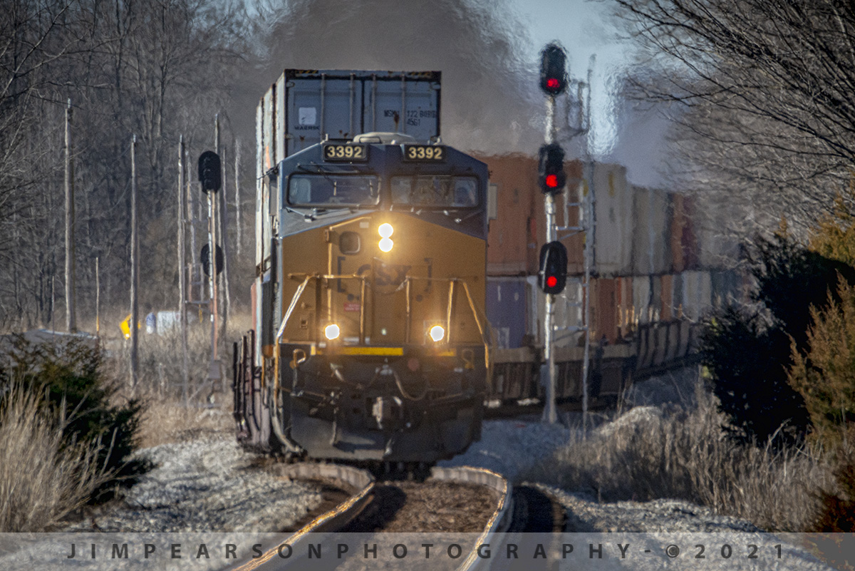 CSX southbound intermodal at Guthrie, Ky

CSXT 3392 leads hot intermodal Q025-23 as it climbs the grade coming out of the south end of Guthrie, Kentucky after meeting a northbound on the Henderson Subdivision on the afternoon of February 23rd, 2021.

The train is running much later than usual as there were delays along it's route today. This is one of the hottest trains on the Henderson Subdivision and the bosses do not like for it to be delayed as it can cost the railroad money! However, things do happen, and trains do get delayed sometimes, it's a fact of life.

This little jog in the track as they come out of Guthrie is a favorite long lens shot of mine. I like how it looks when it makes the jog coming up the slight grade past the signals on the south end. I like to use my 1.4 teleconverter on my Sigma 150-600mm lens to get this shot and you can only pull it off if the weather is cool, otherwise you get a lot of heat distortion, which can produce an interesting photo as well. Technical details are below.

Tech Info: Nikon D800, RAW, Sigma 150-600 @600mm f/9 1/1600, ISO 800.