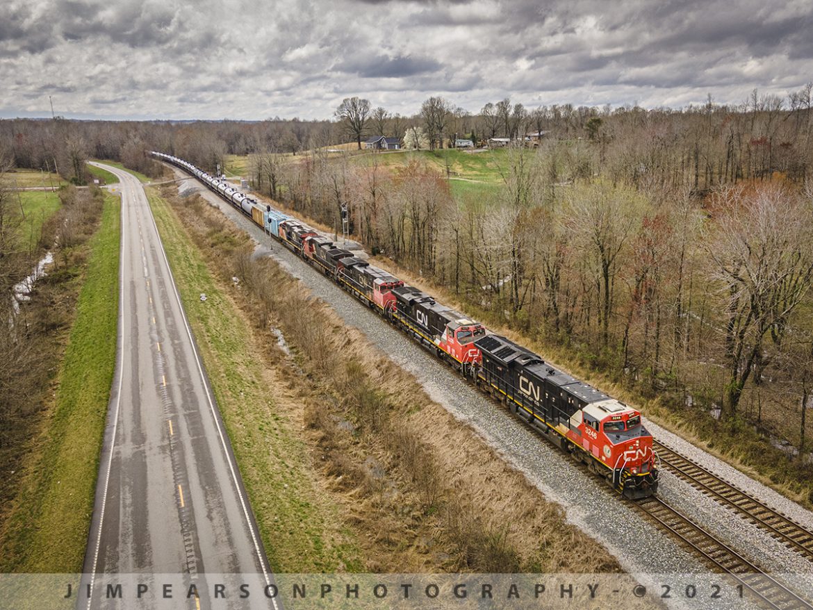 Canadian National northbound on the CSX Henderson Subdivision

Canadian National 3246, 2235, 2518, 2605 and 2293 lead an empty ethanol tank train on March 25th, 2021, after passing the location called Romney, on the CSX Henderson subdivision as it heads north at Nortonville, Ky.

Unit trains of one type or another are some of my favorite trains to photograph and video and when you throw into the mix foreign power on top of that and it makes me want to chase all day long!! I just love the uniformity of the cars, like snakes winding their way along the landscape.

Tech Info: DJI Mavic Air 2 Drone, RAW, 4.5mm (24mm equivalent lens) f/2.8, 1/640, ISO 100.
