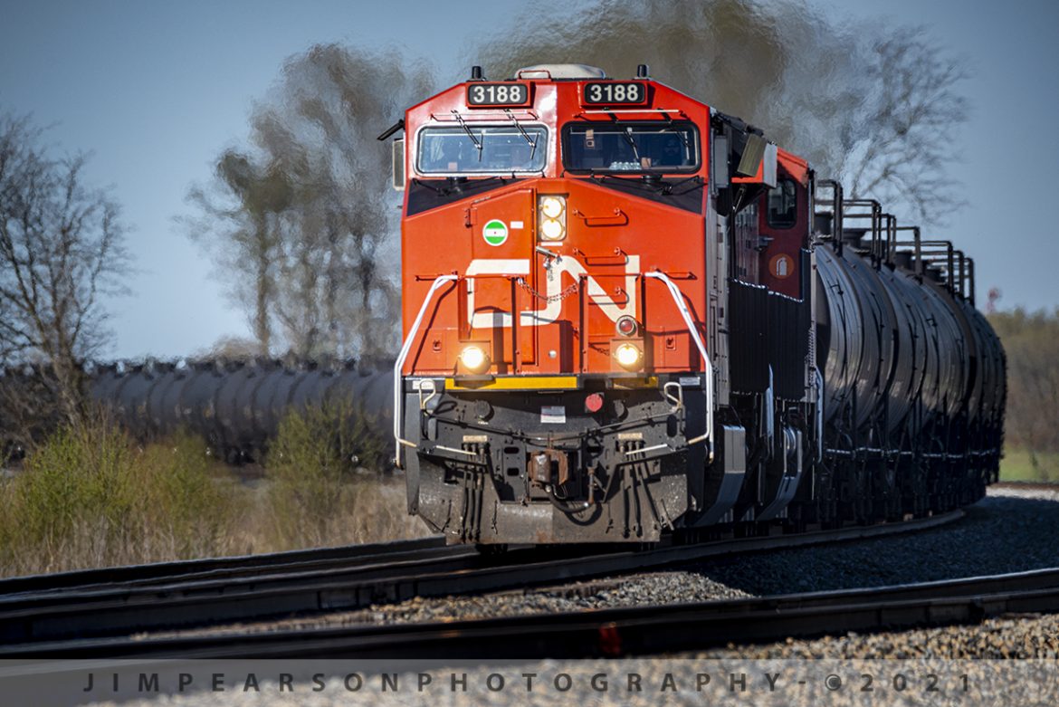 Canadian National 3188 southbound with a load of ethanol 

Beautiful day, beautiful sunlight, signs of spring, Canadian National Railways 3188 leading a loaded ethanol train and a nice curve makes for a great picture as it heads south out of Fulton, Tennessee on the Fulton Subdivision on April 3rd, 2021.

Tech Info: Nikon D800, RAW, Sigma 150-600mm @ 500mm, f/6, 1/1000, ISO 220.