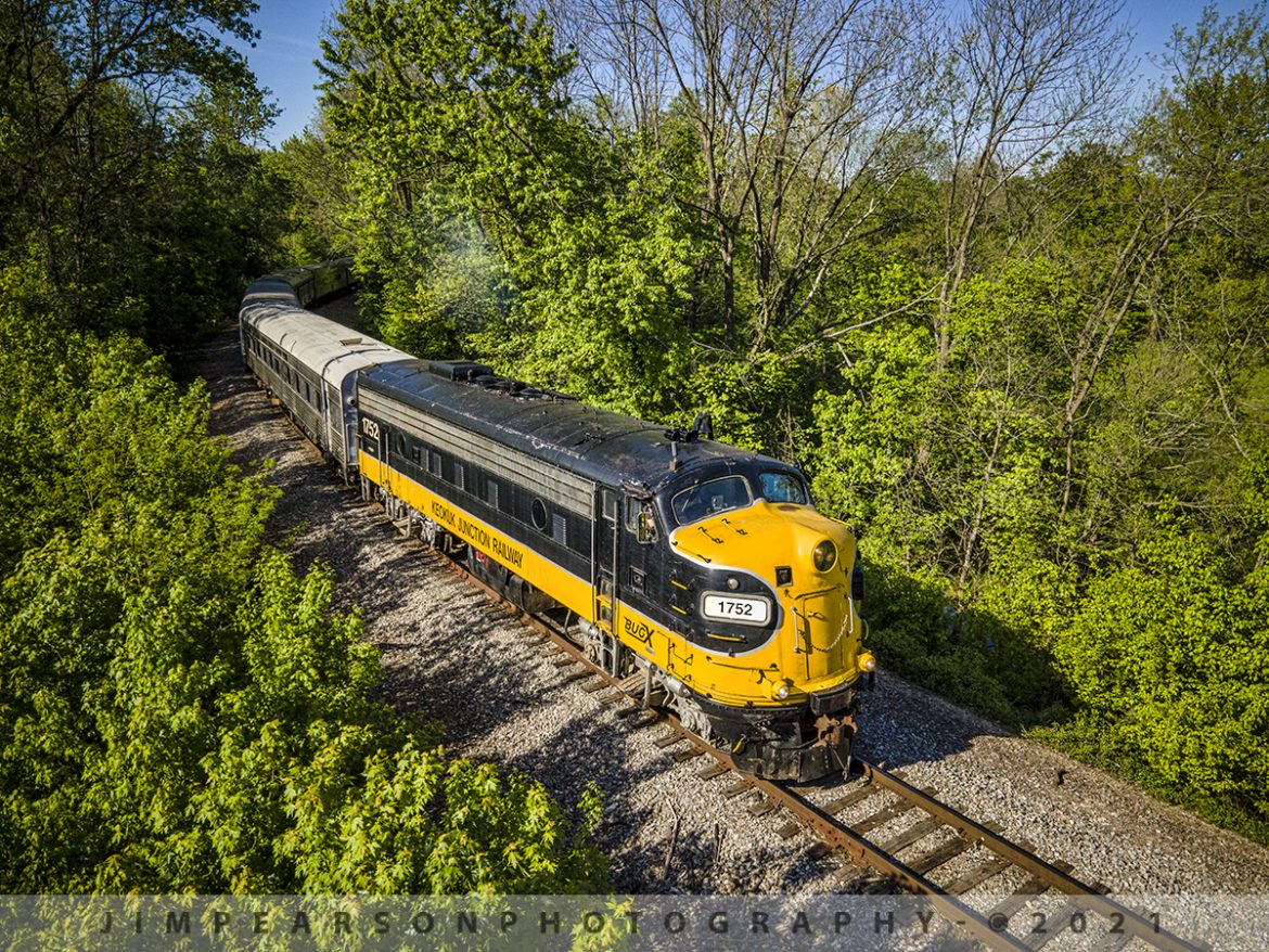 BUGX 1752 heads into Troy, Indiana


Ohio River Scenic Railway BUGX 1752 (EMD FP9A) leads the last train of the day, on May 1st, 2021, as it approaches the Indiana 64 crossing at Troy, Indiana as they begin their reverse move back downtown, where their passengers will be allowed to disembark for a walk around the riverfront and downtown. Afterwards they reboarded the train for the return trip to Tell City, IN.

BUGX 1752 is an ex-CN Rebuilt EMD that is leased now by the Ohio River Scenic Railway from Dieselmotive Company of Northern California. It is a former Canadian National FP9A unit, which was recently sold by Pioneer RailCorp affiliate Keokuk Junction Railway to Dieselmotive and has become one of their lease units.

Ohio River Scenic Railway is headquartered out of Tell City, Indiana and they run through Perry and Spencer Counties in southern Indiana on the weekends. For more and updated information visit their website at https://www.ohiorivertrain.com/ and take a ride behind this beautiful locomotive! 

Tech Info: DJI Mavic Air 2 Drone, RAW, 4.5mm (24mm equivalent lens) f/2.8, 1/800, ISO 100.