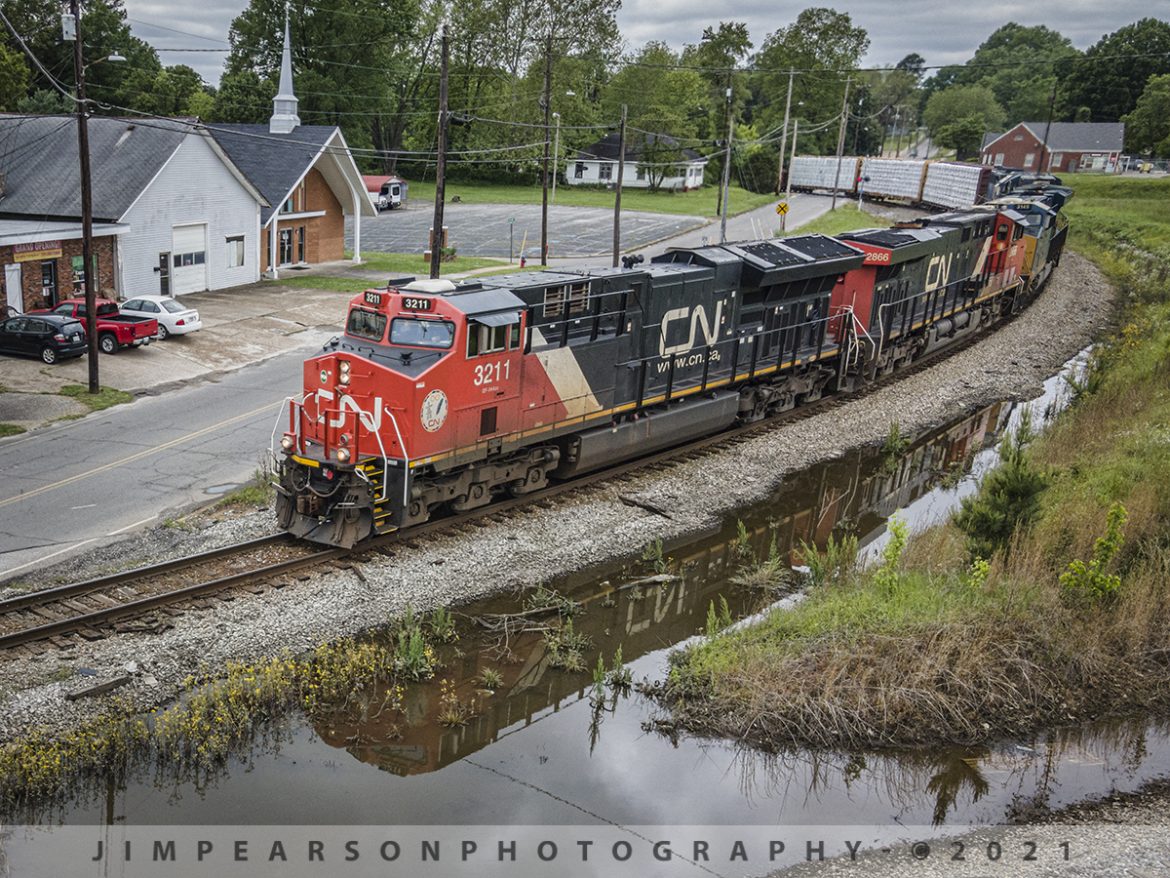 CN 3211 leads CSX Q532 north on the Memphis Sub at McKenzie, TN

Canadian National 3211 and 2866 lead the daily CSX Q532 as it heads through the curve at McKenzie, Tennessee on the CSX Memphis Subdivision as it makes its way to Nashville, TN on May 10th, 2021 from Memphis, TN.

Tech Info: DJI Mavic Air 2 Drone, RAW, 4.5mm (24mm equivalent lens) f/2.8, 1/400, ISO 100.
