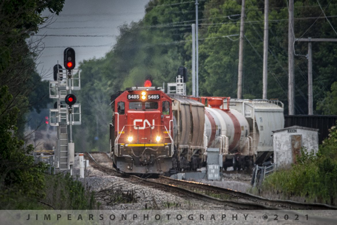 CN FUPD local heads south on the CN Bluford Subdivision, West Paducah, Ky

The Canadian National Fulton to Paducah (FUPD) local, led by CN 5485 and 8887, pulls off the Maxon Branch at the CN/PAL diamond in West Paducah, KY as it heads south on the CN Bluford Subdivision on its way back to Fulton, Ky after interchanging with the Paducah and Louisville Railway.

I really love shooting with my long lens, but its something you really have to learn to use, to be affective! Very hot days can be very difficult due to heat distortion causing heat waves through out your photo. Sometime the effect can be good, others not. Im surprised this one came out as well as it did as the temperature was just over 90. 

The other thing is how the longer lens can really compress and distort the look of the tracks, which is what it has done here in this shot. This was shot at 850mm with my Sigma 150-600 with a 1.4 teleconverter.

Tech Info: Nikon D800, RAW, Sigma 150-600 w/1.4 teleconverter @ 850mm, f/9, 1/2000, ISO 1100.