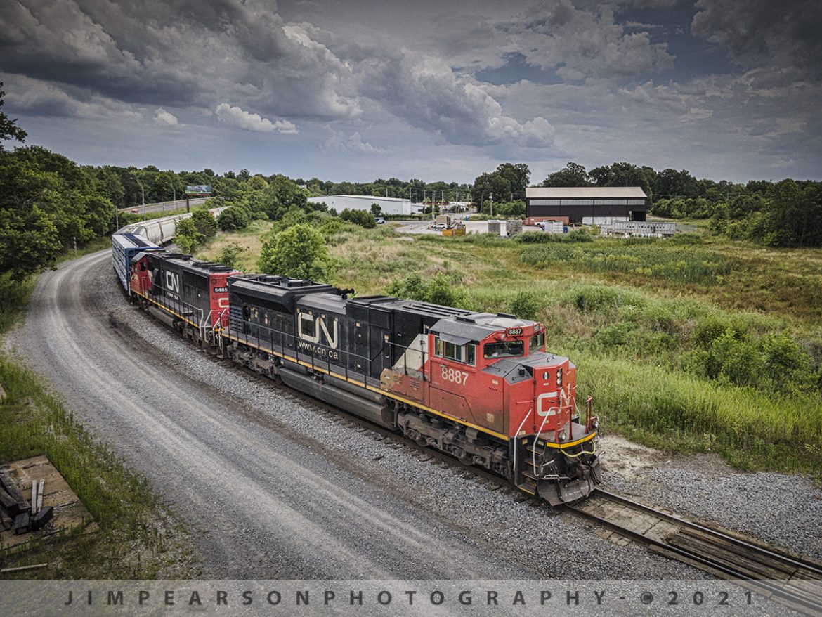 CN FUPD local heads into the PAL yard at Paducah, Ky

The daily Canadian National Fulton to Paducah (FUPD) local, led by CN 8887 and 5485 rounds the curve leading into the north end of the Paducah and Louisville Railway yard at Paducah, KY under stormy skies on June 29th, 2021, to do its interchange work.

Many people put their cameras away when the clouds roll in and skies get dark, but for me thats just when things get interesting! I love how they add drama to the scene and dont forget, trains operate 24/7 in all kinds of weather! Just because it isnt sunny and the lights not on the right side of the train, doesnt mean there isnt great photos to be had! Personally, I keep a large golf umbrella in the back of my SUV just for bad weather days! Get out there!!

Tech Info: DJI Mavic Air 2 Drone, RAW, 4.5mm (24mm equivalent lens) f/2.8, 1/1000, ISO 100.