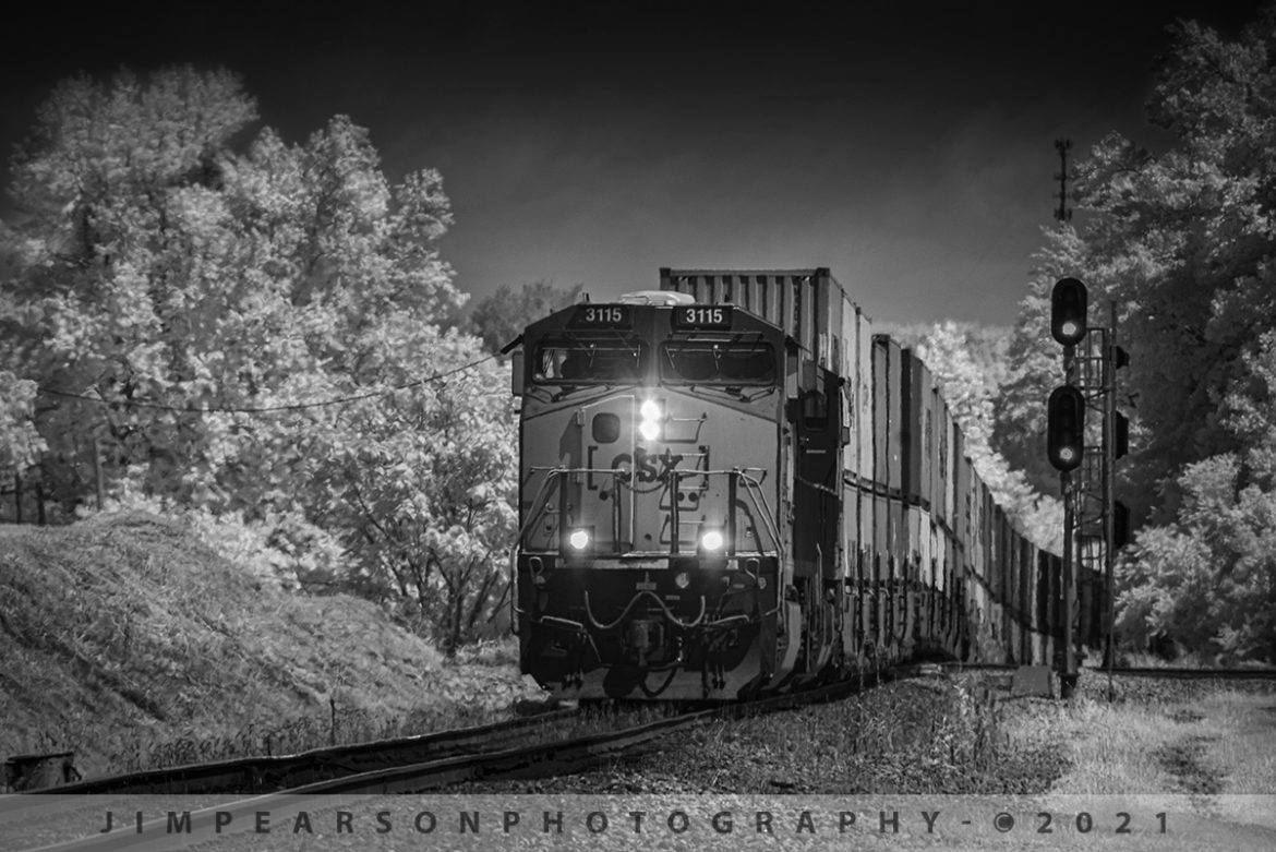 CSXT 3115 pulls upgrade leading Q025 at Mortons Gap, KY

CSX Q025 pulls up grade out of the valley with CSXT 3115 leading the way at Mortons Junction on the Henderson Subdivision as it heads south at Mortons Gap, KY in this infrared shot on July 16th, 2021 with over two miles of containers trailing behind.

Tech Info: Fuji XT-1, RAW, Converted to 720nm B&W IR, Sigma 150-600 @ 300mm, f/8, 1/500, ISO 400.