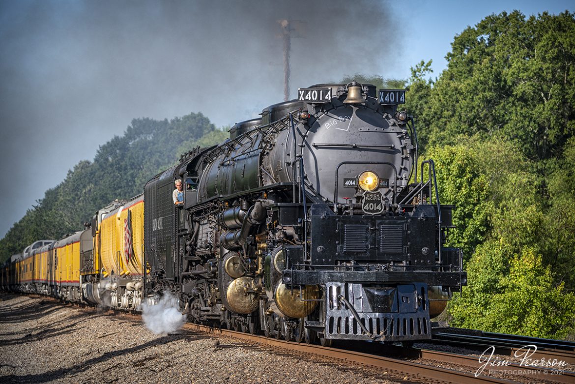 Union Pacific 4014, the Big Boy, heads north on UPs Hoxie Subdivision at Jacksonville, Arkansas as part of its 2021-month long tour around the United States on August 27th, 2021! 

Here engineer Ed Dickens keeps an eye on the tracks ahead as it approaches the N JP Wright Loop Road crossing, perhaps scanning for the legendary the Loop Road Monster (Bigfoot) which has been sighted in this rural area in the past, but there wasnt any sight of him during the big boys run through the area! I guess bigfoot doesnt like steam trains nearly as much as the throngs of railfans that chased it!

UP 4014 is an articulated 4-8-8-4 steam locomotive that was manufactured by the American Locomotive Company. There were a total 25 of these giants built and of the eight remaining locomotives this is the only operational one.

The Big Boy was on a month-long tour around the Midwest through, Arkansas, Colorado, Kansas, Illinois, Louisiana, Missouri, Nebraska, Oklahoma, Texas, and Wyoming before arriving home in Cheyenne, Wyoming on September 7th.

Tech Info: Nikon D800, RAW, Sigma 150-600mm @ 150mm, f/6, 1/1600, ISO 320.

#trainphotography #railroadphotography #trains #railways #jimpearsonphotography