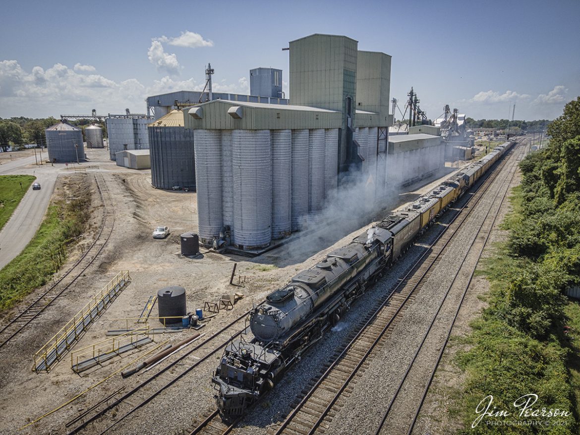 Union Pacific steam locomotive 4014, the Big Boy, with its entire train in view, passes the Farmers Elevator complex as it heads north on the UP Hoxie Subdivision at Newport, Arkansas on August 27th, 2021. Here it is on the leg of its trip from Little Rock, AR to Poplar Bluff, MO during its month-long tour around the Union Pacific line.

The Big Boy is an articulated 4-8-8-4 steam locomotive which was manufactured by the American Locomotive Company (ALCO) of Schenectady, New York in 1941. There were a total 25 of these giants built and of the eight remaining locomotives this is the only operational one. 

Tech Info: DJI Mavic Air 2 Drone, RAW, 4.5mm (24mm equivalent lens) f/2.8, 1/800, ISO 100, August 27, 2021. 

#trainphotography #railroadphotography #trains #railways #dronephotography #jimpearsonphotography