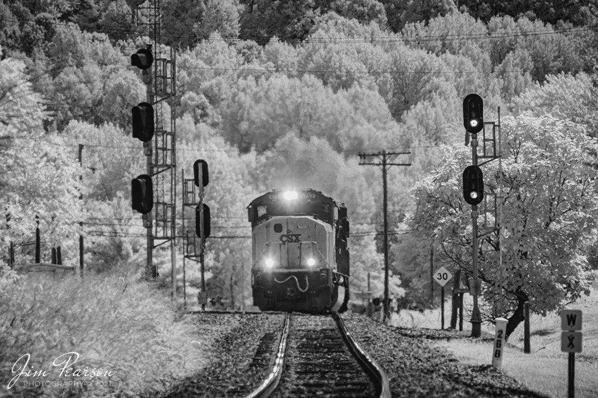 An infrared photo of CSX X605-04 heading north as it takes the cut off at Mortons Junction in Mortons Gap, Kentucky, with CSXT 9012 leading the way. It is a Waycross, GA  Rose Lake, IL train that was rerouted via the Henderson Subdivision due to flooding from the recent hurricanes. The lead engine is a Dash 9 in YN2 paint, led by CSXT 9012 which is a reactivated unit that has been in storage.

Tech Info: Fuji XT-1, RAW, Converted to 720nm B&W IR, Sigma 150-600 @ 300mm, f/5.6, 1/250, ISO 200, September 1, 2021.

#trainphotography #railroadphotography #trains #railways #jimpearsonphotography #infraredtrainphotography #infraredphotography
