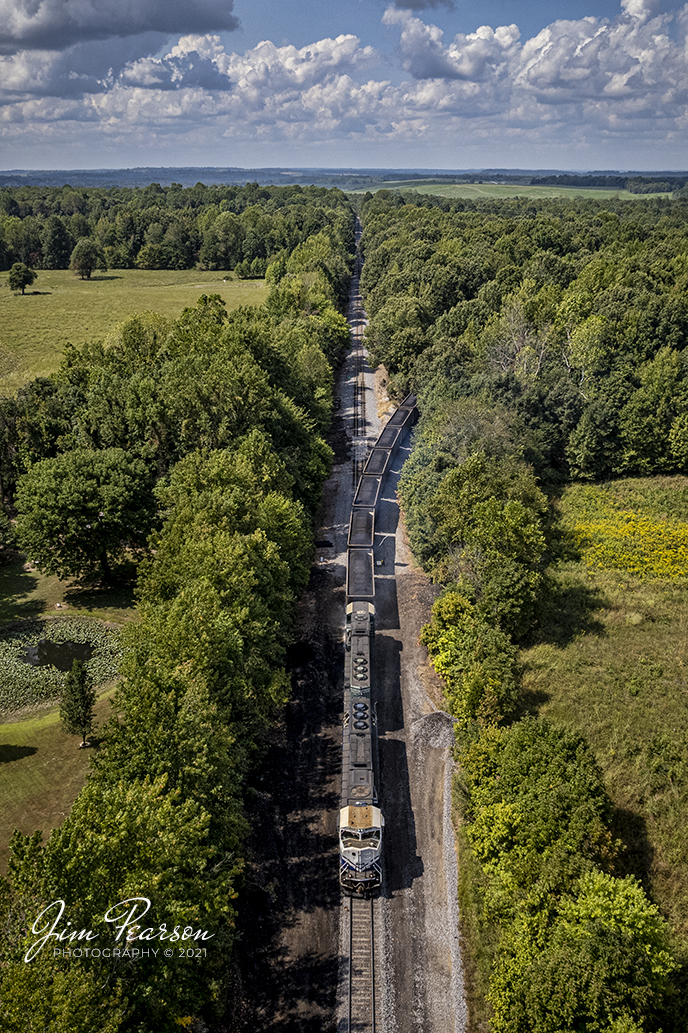 The Paducah and Louisville (PAL) LGE coal train, with UK 4522 locomotive leading, pulls off the Warrior Coal Mine lead onto the PAL main as they approach West Yard at Madisonville, Ky. From here they begin their run to the Louisville Gas and Electric power plant in the Kosmosdale neighborhood of Louisville, Kentucky.

Tech Info: DJI Mavic Air 2S Drone, RAW, 22mm, f/2.8, 1/2000, ISO 130, September 13, 2021.

#trainphotography #railroadphotography #trains #railways #dronephotography #jimpearsonphotography