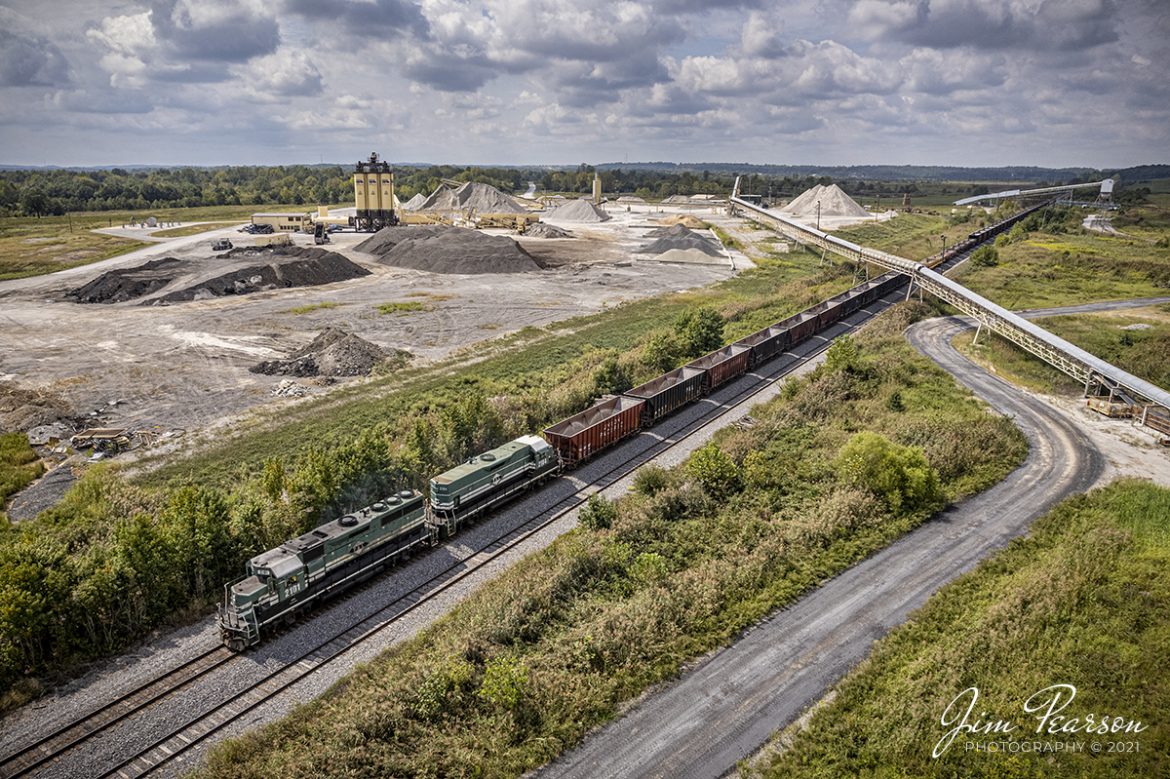 The Paducah and Louisville (PAL) 2101 and 2104 lead an empty rock train as they depart from the Scotty's Rock Yard complex at Madisonville, Kentucky, and head north to Litchfield, KY, for another load, on September 15th, 2021.

Tech Info: DJI Mavic Air 2S Drone, RAW, 22mm, f/2.8, 1/2500, ISO 130, September 13, 2021.

#trainphotography #railroadphotography #trains #railways #dronephotography #jimpearsonphotography