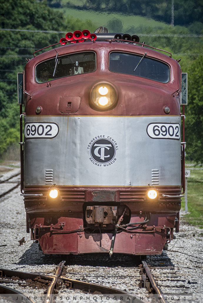 This was my first time chasing the Tennessee Moonshine Sippin' Excursion Train from the Tennessee Central Railway Museum (TCRX), which operates out of Nashville, TN, on June 12th, 2021. While it was a hot and muggy day, me and fellow railfan Ryan Scott, of Steelrails, had a great time chasing this train from Nashville to Watertown, TN and back, along the Nashville, and Eastern Railway line. 


Here Tennessee Central Railway Museums E8 unit, 6902 sits idling, after running around it's train at Watertown in preparation for their return trip to Nashville.


According to their website: EMD E8 6902 was built as New York Central 4084 in 1953. This unit would've been at the head end of many name trains of the Central's Great Steel Fleet; including the 20th Century Limited, the Empire State Express, and the Ohio State Limited, among others. The E8 (termed DPA-5e by NYC) would serve in passenger service through the Penn Central merger, and commuter service for New Jersey Transit, before settling down at the New Georgia Railroad in 1992. When the latter operation folded, a museum member purchased this unit for use on the Broadway Dinner Train, which prompted the silver and maroon colors worn today.


Since 1989, TCRM has been running passenger excursions from Nashville to points east such as Lebanon, Watertown, Baxter, Cookeville, and Monterey, Tennessee. 


Tech Info: Nikon D800, RAW, Sigma 150-600mm @ 390mm, f/8, 1/2000, ISO 360.


#trainphotography #railroadphotography #trains #railways #jimpearsonphotography #trainphotographer #railroadphotographer