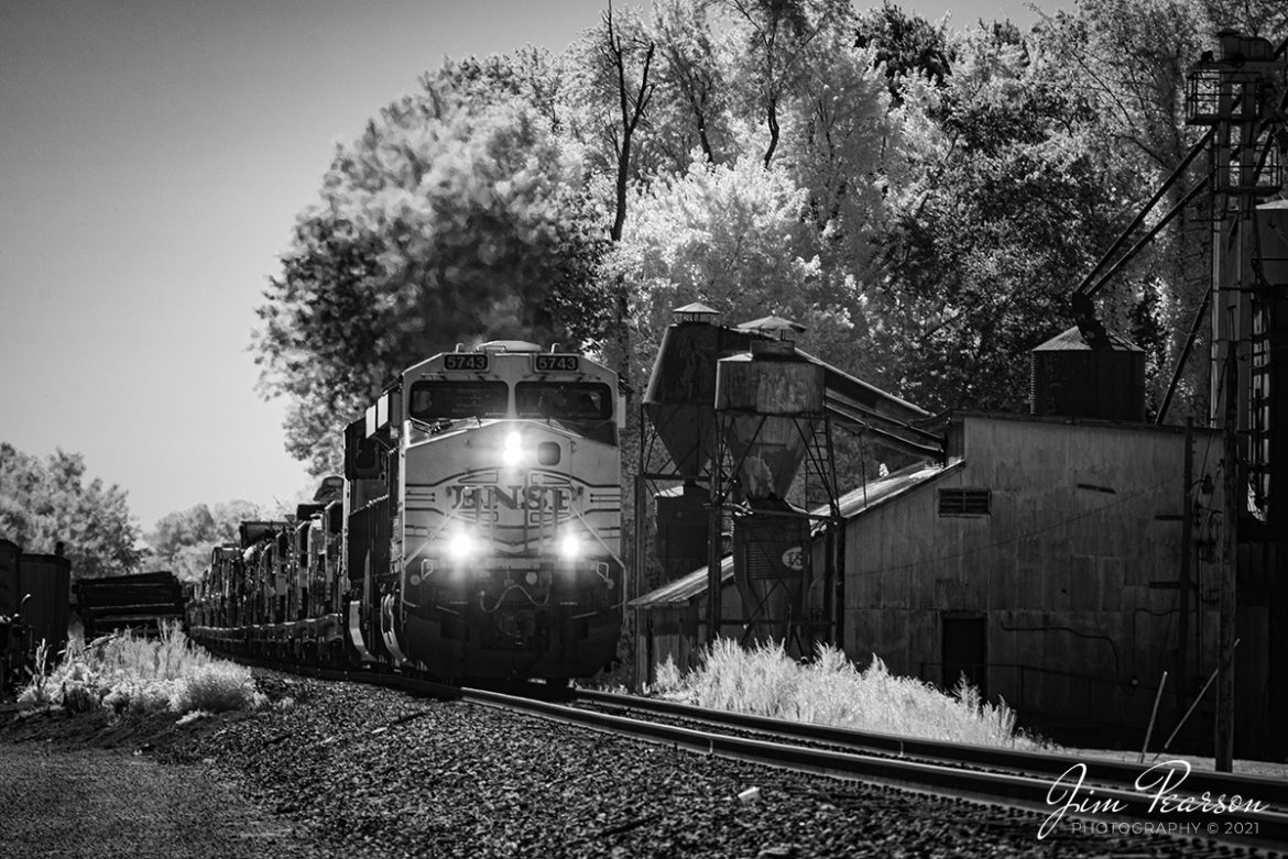 Infrared photograph of BNSF 5743 and 8363 as they head up a 7,600ft military train on August 11th, 2021, as it passes through Pembroke, Kentucky, with CSX W844-03. This was a third military move heading north to Hopkinsville, KY this week. At Hopkinsville they backed the train onto the Ft. Campbell wye where Ft. Campbell rail took it on the rest of the way to the base.

Tech Info: Fuji XT-1, RAW, sensor converted to 720nm B&W IR, Sigma 150-600mm @400mm, f/7.1, 1/250, ISO 200.

#jimpearsonphotography #infraredphotography #irphotography, #infraredtrains #trainphotographer #railroadphotographer