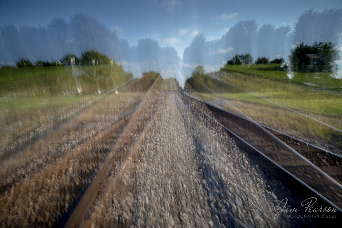 This is my second post where I’m delving into a new technique in my photography, as there’s always something new to learn! It’s called Intentional Camera Movement (or ICM) and this is a single image shot the tracks looking south from the crossing at middle Kelly siding at Kelly, Kentucky, on the Henderson Subdivision on September 28th, 2021.

Traditional photography — or rather photography as most expects it to be — requires the camera to be held steady and the subject to be sharp. Intentional Camera Movement (or ICM) turns that ideal on its head. By using a long shutter speed, the photographer can deliberately move the camera to paint with light and accentuate the tone and texture of the subject. In doing so, one can create stunning impressionist, abstract or minimalist images.

While this style or technique may not be for everyone and while it is a bit like panning with your subject, it is different as the movement can be and often is in any direction during the exposure. I’m excited to add it to my work and look forward to learning to do ICM photography and I hope you enjoy this abstract view of my world!

Tech Info: Nikon D800, ND 64 Filter, RAW, Nikon 10-24mm DX lens @ 10mm, f/8, 1.3 seconds, upward swish, ISO 200.

#trainphotography #railroadphotography #trains #railways #jimpearsonphotography #trainphotographer #railroadphotographer #icmphotography #intentionalcameramovement #2_SingleExposure_InCamera_ICM_GeneralPostProcessing