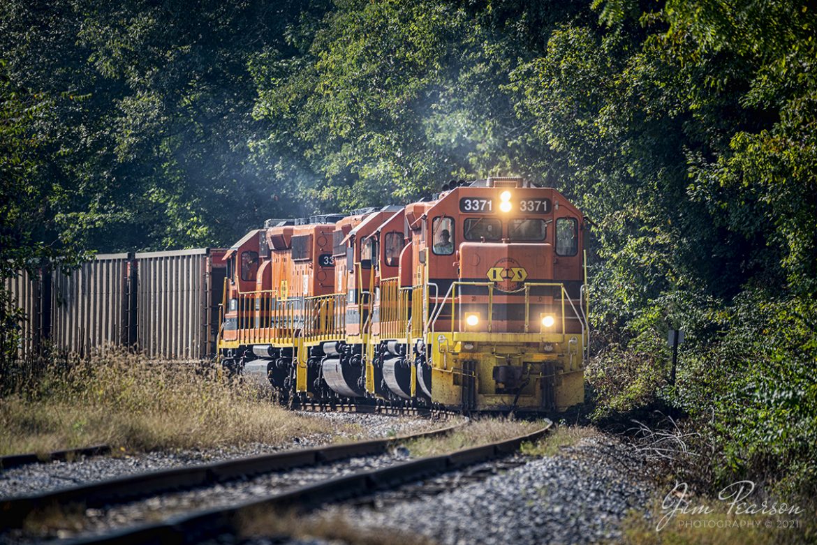 Indiana Southern Railroad (ISRR) 3371, 3388, 3372 and 3387, lead an empty coal train north at Washington Township, Indiana, as the crew takes the train to Elnora, IN where they tied it down for the Indiana Railroad (INRD) to pick up. The INRD crew will then take the train on their railroad to Bear Run Mine at Dugger, IN for another load of coal for the Petersburg Generating Station at Petersburg, IN.


According to Wikipedia: The Indiana Southern Railroad (reporting mark ISRR) is a short line or Class III railroad operating in the United States state of Indiana. It began operations in 1992 as a RailTex property and was acquired by RailAmerica in 2000. RailAmerica was itself acquired by Genesee & Wyoming in December 2012. They operate 186 miles of track from Indianapolis to Evansville, Indiana.


Tech Info: Nikon D800, RAW, Sigma 150-600 @ 500mm, f/6.3, 1/640, ISO 400.


#trainphotography #railroadphotography #trains #railways #dronephotography #trainphotographer #railroadphotographer #jimpearsonphotography