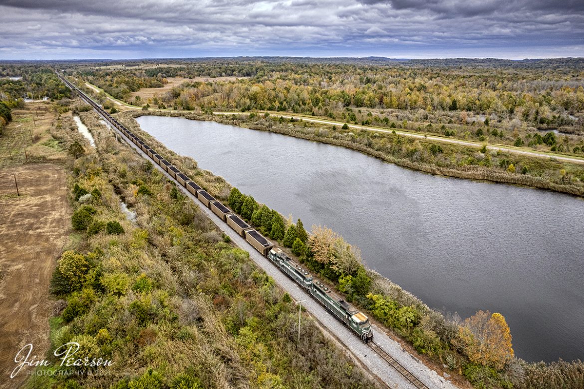 The DPU end of Paducah and Louisville Railway Louisville Gas and Electric loaded coal train brings up the rear as it heads north past Pond Rivers siding on October 25th, 2021, with the entire train in view from this drone viewpoint on a stormy fall afternoon, east of Madisonville, Ky.

Tech Info: DJI Mavic Air 2S Drone, RAW, 22mm, f/2.8, 1/800, ISO 100.

#trainphotography #railroadphotography #trains #railways #dronephotography #trainphotographer #railroadphotographer #jimpearsonphotography