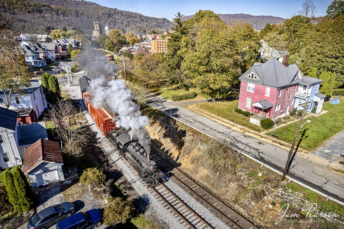 Everett Railroad #11 pulls out of downtown Roaring Spring, Pennsylvania, from their depot, as it heads off on the next leg of a Historic Transport Preservation, Inc, Steam Special on November 6th, 2021.

According to their website: Steam locomotive number 11 was constructed in 1920 by the Cooke Works of the American Locomotive Company (Alco) in Paterson, New Jersey. It is a “2‑6‑0” or “Mogul” type and was one of 54 engines of four different wheel arrangements built between 1920 and 1925 intended for export to Cuba and use in that country’s sugar cane fields.

Tech Info: Nikon D800, RAW, Sigma 24-70 @ 24mm, f/2.8, 1/2000, ISO 140.

#trainphotography #railroadphotography #trains #railways #jimpearsonphotography #trainphotographer #railroadphotographer