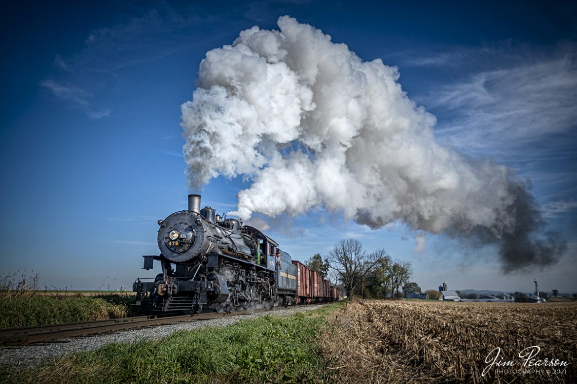 Norfolk and Western 475 heads west on the Strasburg Railroad through the cold Autumn air producing a spectacular show of steam trailing over the train, on November 7th, 2021, at Strasburg, Pennsylvania. 

According to Wikipedia: Strasburg Railroad (Norfolk and Western) No. 475 is a 4-8-0 "Mastodon" type steam locomotive owned and operated by the Strasburg Railroad outside of Strasburg, Pennsylvania. Built by the Baldwin Locomotive Works in June 1906, it was part of the Norfolk and Western's first order of M class numbered 375-499. Today, No. 475 is the only operating 4-8-0 type in North America and the Strasburg Rail Road's oldest operating steam locomotive.

Tech Info: Nikon D800, RAW, Nikon 10-20mm @ 18mm, f/4.2, 1/1600, ISO 180.

#trainphotography #railroadphotography #trains #railways #jimpearsonphotography #trainphotographer #railroadphotographer
