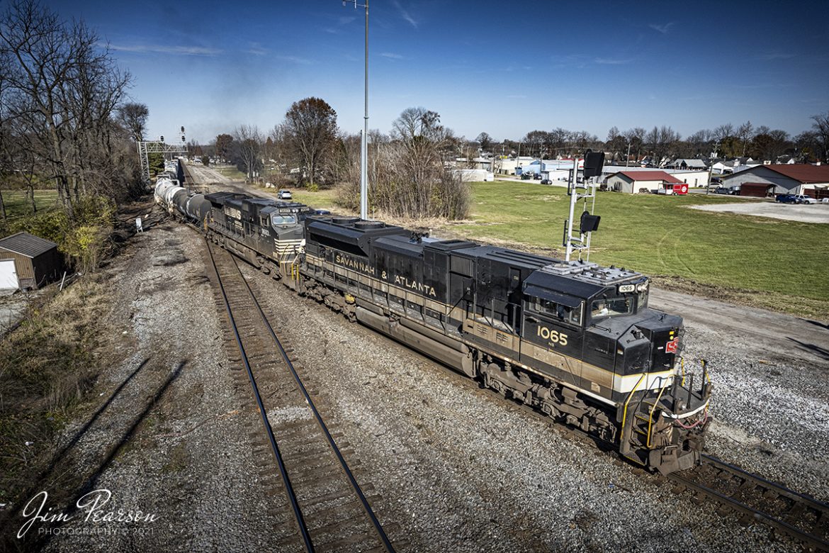 Norfolk Southern railway Savannah & Atlanta 1065 Heritage Unit leads NS 167 as it passes through Southern Crossover over the CSX CE&D Subdivision at Princeton, Indiana, on its way east on the NS East-West District on December 3rd, 2021. This unit completes my goal of photographing all the 20 NS Heritage units! 

According to the NS Website: Savannah & Atlanta Railway (SR, EMD) began life as the Brinson Railway in 1906, slowly expanding from Savannah toward the Northwest. It was consolidated with other small railroads to become the Savannah & Atlanta in 1917. Central of Georgia bought the S&A in 1951.

Tech Info: DJI Mavic Air 2S Drone, RAW, 22mm, f/2.8, 1/2000, ISO 130.

#trainphotography #railroadphotography #trains #railways #dronephotography #trainphotographer #railroadphotographer #jimpearsonphotography