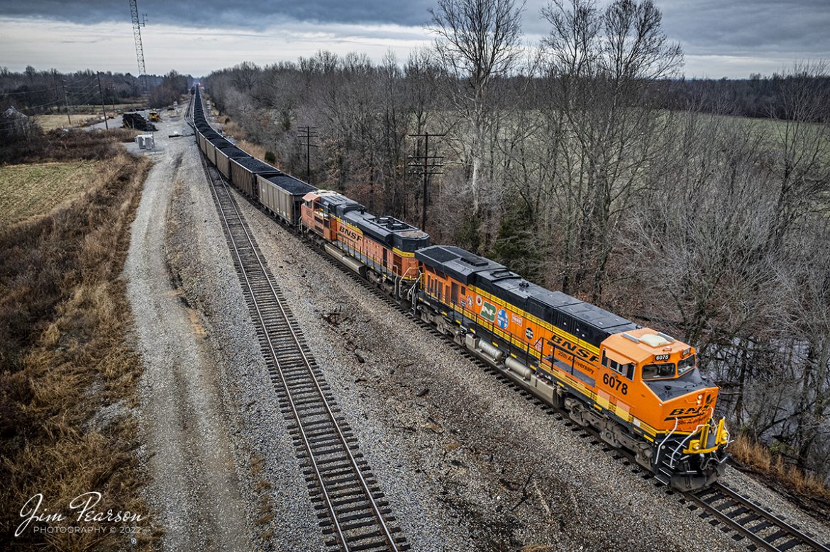 BNSF 25th Anniversary Unit 6078 brings up the rear as the last DPU on a loaded coal train at Chiles Junction in West Paducah, Kentucky as they make their way north on the CN Beardstown Subdivision to the 4 Rivers Coal loop on the Ohio River at West Paducah on December 29th, 2021. 

Tech Info: DJI Mavic Air 2S Drone, RAW, 22mm, f/2.8, 1/80, ISO 130.

#trainphotography #railroadphotography #trains #railways #dronephotography #trainphotographer #railroadphotographer #jimpearsonphotography