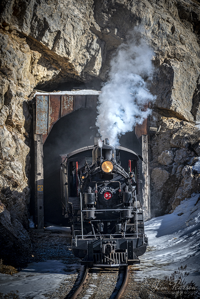 Nevada Northern Railway steam locomotive #93 pulls out of tunnel one as it heads southbound through Robinson Canyon after departing Ely, Nevada during the final day of their 3-day Winter Photography Charter on February 13th, 2022.

Locomotive #93 is a 2-8-0 that was built by the American Locomotive Company in January of 1909 at a cost of $17,610. It was the last steam locomotive to retire from original revenue service on the Nevada Northern Railway in 1961 and was restored to service in 1993.

According to Wikipedia: The Nevada Northern Railway Museum is a railroad museum and heritage railroad located in Ely, Nevada and operated by a historic foundation dedicated to the preservation of the Nevada Northern Railway.

The museum is situated at the East Ely Yards, which are part of the Nevada Northern Railway. The site is listed on the United States National Register of Historic Places as the Nevada Northern Railway East Ely Yards and Shops and is also known as the "Nevada Northern Railway Complex". The rail yards were designated a National Historic Landmark District on September 27, 2006. The site was cited as one of the best-preserved early 20th-century railroad yards in the nation, and a key component in the growth of the region's copper mining industry. Developed in the first decade of the 20th century, it served passengers and freight until 1983, when the Kennecott Copper Company, its then-owner, donated the yard to a local non-profit for preservation. The property came complete with all the company records of the Nevada Northern from its inception.

Tech Info: Nikon D800, RAW, Sigma 15-600mm @ 165mm, f/5, 1/2000, ISO 400.

#trainphotography #railroadphotography #trains #railways #jimpearsonphotography #trainphotographer #railroadphotographer #steamtrains #nevadanorthernrailway