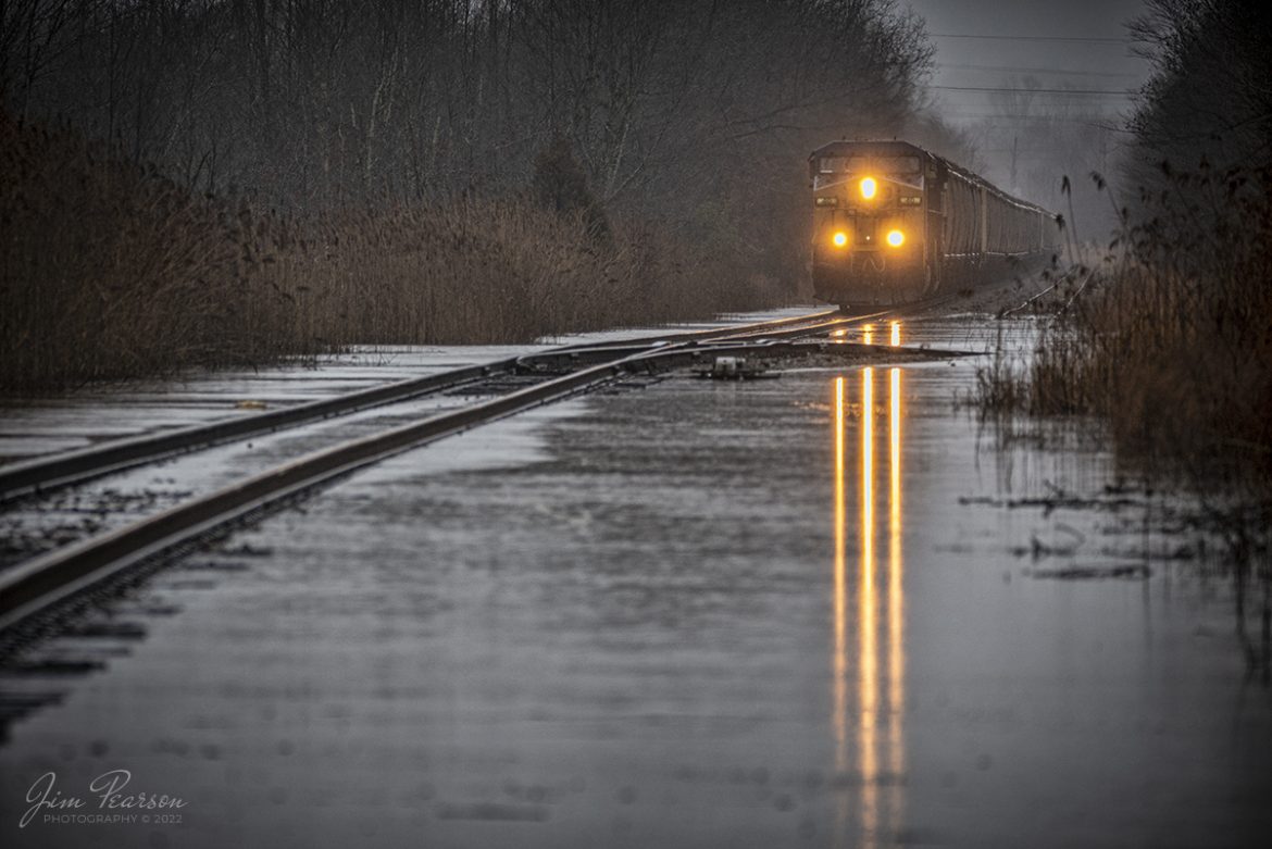 Our area has got a lot of rain this winter and February 17th, 2022, was one of those days when one of the winter storms dropped a lot of rain on the region over a 24-hour period. Here I caught an empty grain train, CSX G438, as it made its way past a flooded area around the house track at Earlington, Kentucky as it heads north on the Henderson Subdivision.

Tech Info: Nikon D800, RAW, Sigma 150-600 @ 290mm, f/5.6, 1/160, ISO 450.

#trainphotography #railroadphotography #trains #railways #jimpearsonphotography