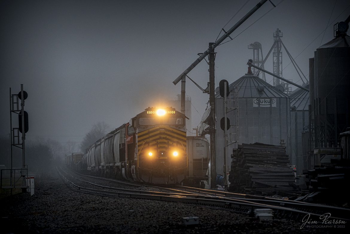 Norfolk Southern Heritage unit 8100, Nickel Plate Road, and Canadian National 5702 lead CSX Q512-24 (Radnor Yard - Nashville, TN - Avon, IN Daily) pulls through Trenton, Kentucky on a cold, wet, foggy and rainy late afternoon as it heads north on the CSX Henderson Subdivision on February 24th, 2022.

One of the things I like about railfanning the Henderson Subdivision is because we get all kinds of interesting and different foreign power that runs up and down the line! While most of it is CSX, we do get a mix of just about every major railroad on this line at some point in time during each week. You never know when its coming, but when it does as with this unit, railfans gather along the tracks for their crack at their own capture of the move and Im no exception!

While you cant control the weather for these shots, railroads operate in all kinds of weather and so Im trackside when the train is! Hardest thing about shooting in bad weather is getting out the door in my opinion! A large golf umbrella helps a lot!!

Tech Info: Nikon D800, RAW, Sigma 150-600 @ 230mm, f/5.3, 1/800, ISO 900.

#trainphotography #railroadphotography #trains #railways #jimpearsonphotography #trainphotographer #railroadphotographer