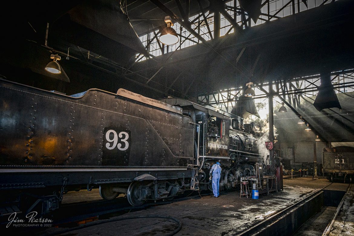Nevada Northern Railway engine 93 sits quietly chuffing away, as beams of sunlight stream through the engine house windows as a crewmember works on the engine, after another day of work at Ely, Nevada on February 11th, 2022. 

Locomotive #93 is a 2-8-0 that was built by the American Locomotive Company in January of 1909 at a cost of $17,610. It was the last steam locomotive to retire from original revenue service on the Nevada Northern Railway in 1961 and was restored to service in 1993.

According to Wikipedia: The Nevada Northern Railway Museum is a railroad museum and heritage railroad located in Ely, Nevada and operated by a historic foundation dedicated to the preservation of the Nevada Northern Railway.

Tech Info: Nikon D800, RAW, Nikon 10-24mm @ 14mm, f/5.6, 1/320, ISO 1000.