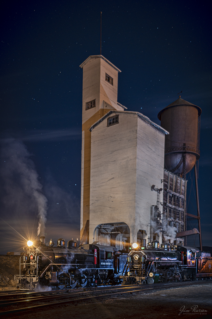 Nevada Northern Railway steam locomotives 93 and 81 pose next to the coaling tower and water tank in the year during the museums Winter Photo Charter at Ely, Nevada, under a cold, but beautiful starry night on February 11th, 2022.

Locomotive #93 is a 2-8-0 that was built by the American Locomotive Company in January of 1909 at a cost of $17,610. It was the last steam locomotive to retire from original revenue service on the Nevada Northern Railway in 1961 and was restored to service in 1993.

The Nevada Northern No. 81 is a "Consolidation" type (2-8-0) steam locomotive it was built for the Nevada Northern in 1917 by the Baldwin Locomotive Works in Philadelphia, PA, at a cost of $23,700. It was built for Mixed service to haul both freight and passenger trains on the Nevada Northern railway.

According to Wikipedia: "The Nevada Northern Railway Museum is a railroad museum and heritage railroad located in Ely, Nevada and operated by a historic foundation dedicated to the preservation of the Nevada Northern Railway."

Tech Info: Nikon D800, RAW, Nikon 10-24mm @ 24mm, f/4, 30 seconds, ISO 100.

#trainphotography #railroadphotography #trains #railways #jimpearsonphotography #trainphotographer #railroadphotographer