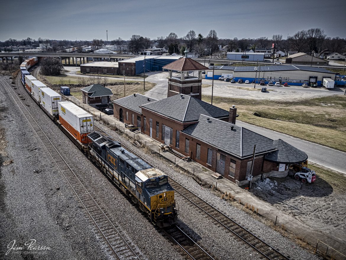 CSXT 3385 leads CSX intermodal I028 as it passes the old L&N Railway depot at Henderson, Kentucky as it heads north on the Henderson Subdivision on March 4th, 2022.

Im told that the Railmark Holdings, Inc has purchased the depot and is currently continuing restoration on the station. Ive not be able to find out what their plans for the depot include yet.

According to their website: Railmark, its brands, and subsidiaries are leaders in the railroad industry in North America and around the world. An accomplished provider of railroad transportation, rail services, and rail systems development, Railmark provides a complete and fully integrated program for rail network improvement and rail management services to railroads, governments, municipalities, and industrial clients.

Railmark also owns and operates railroads in North America and sponsors philanthropic initiatives through its Railmark Foundation Limited. Together the Railmark group of rail service companies work around the world each day to make rail transportation better by improving economies and the quality of human life.

Tech Info: DJI Mavic Air 2S Drone, RAW, 22mm, f/2.8, 1/3200, ISO 140.

#trainphotography #railroadphotography #trains #railways #jimpearsonphotography #trainphotographer #railroadphotographer