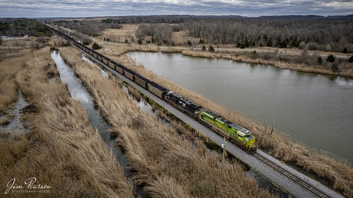 Norfolk Southern Heritage Unit 1072, Illinois Terminal, and NS 8090 bring up the rear of a northbound loaded coal train on the Paducah and Louisville Railway as they pass a CSX Loaded coal train in the Pond River Siding, west of Madisonville, Kentucky on March 18th, 2022. 

Tech Info: DJI Mavic Air 2S Drone, RAW, 22mm, f/2.8, 1/1000, ISO 150.

#trainphotography #railroadphotography #trains #railways #dronephotography #trainphotographer #railroadphotographer #jimpearsonphotography