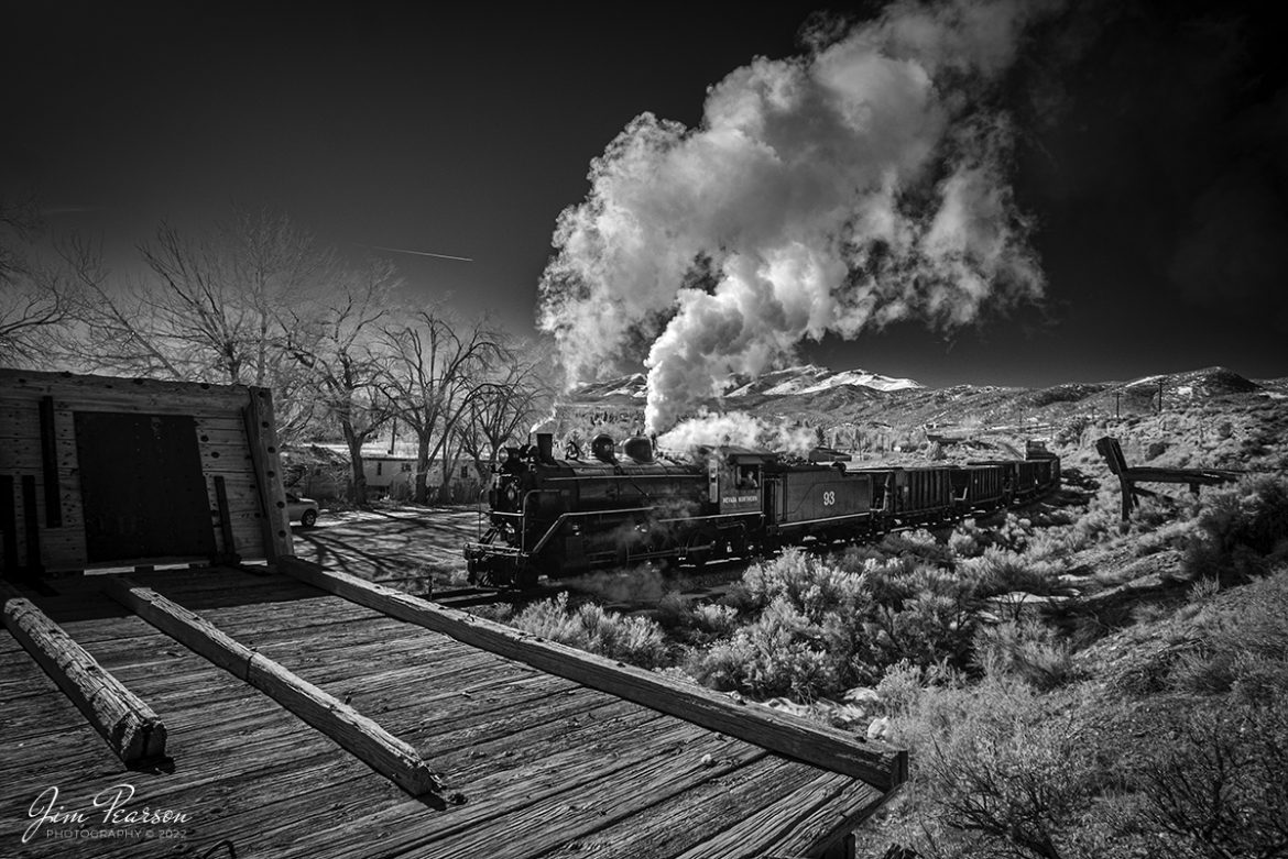 In this dramatic black and white Infrared photo Nevada Northern Railway engine 93 heads back to Ely, Nevada with an empty ore train under the control of engineer Jim Montague and fireman, as they pass the old ore loading docks at the Lackawanna Crossing on the Robinson Canyon Route on February 12th, 2022.


They werent moving ore but was a part of the museums three-day Winter Photo Charter event that ran from February 11-13th, 2022. This was my first trip to the Nevada Northern and wont be my last!


Locomotive #93 is a 2-8-0 that was built by the American Locomotive Company in January of 1909 at a cost of $17,610. It was the last steam locomotive to retire from original revenue service on the Nevada Northern Railway in 1961 and was restored back into service in 1993, according to the NNRY website.


According to Wikipedia: The Nevada Northern Railway Museum is a railroad museum and heritage railroad located in Ely, Nevada and operated by a historic foundation dedicated to the preservation of the Nevada Northern Railway.


Tech Info: Fuji XT-1, RAW, Converted to 720nm B&W IR, Nikon 10-24 @ 14mm, f/4, 1/750, ISO 200.


#trainphotography #railroadphotography #trains #railways #jimpearsonphotography #infraredtrainphotography #infraredphotography #trainphotographer #railroadphotographer #steamtrains #nevadanorthernrailway