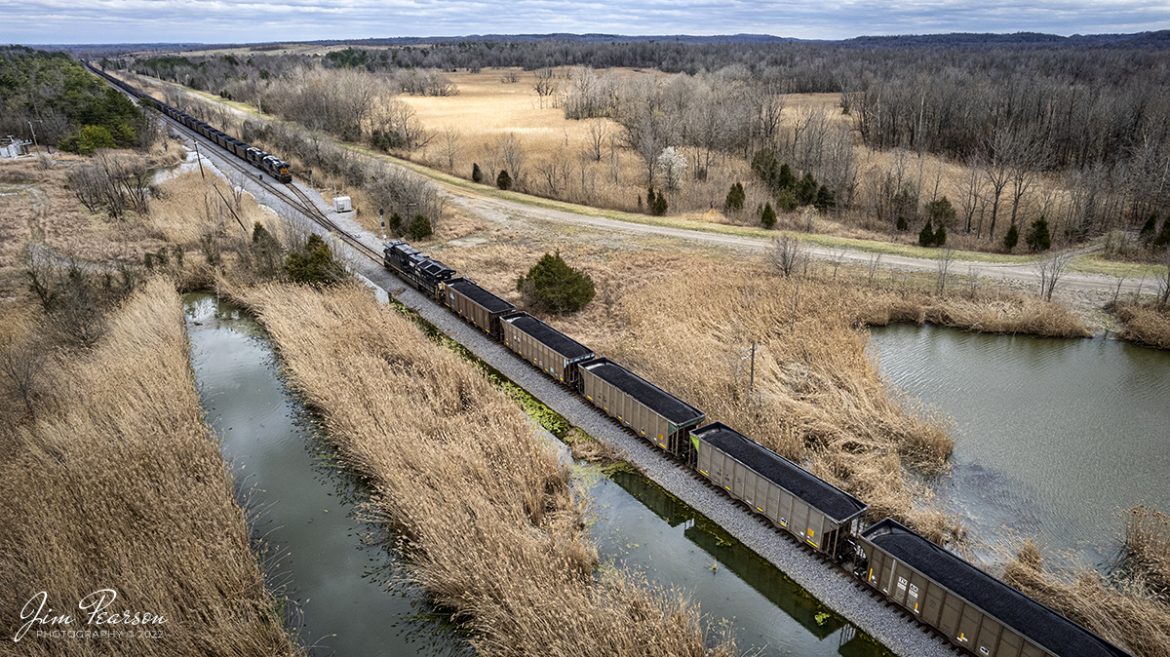 Norfolk Southern locomotive 3639 heads up a northbound loaded coal train on the Paducah and Louisville Railway as they pass a CSX Loaded coal train in the Pond River Siding, west of Madisonville, Kentucky on March 18th, 2022. 

Tech Info: DJI Mavic Air 2S Drone, RAW, 22mm, f/2.8, 1/800, ISO 120.

#trainphotography #railroadphotography #trains #railways #dronephotography #trainphotographer #railroadphotographer #jimpearsonphotography