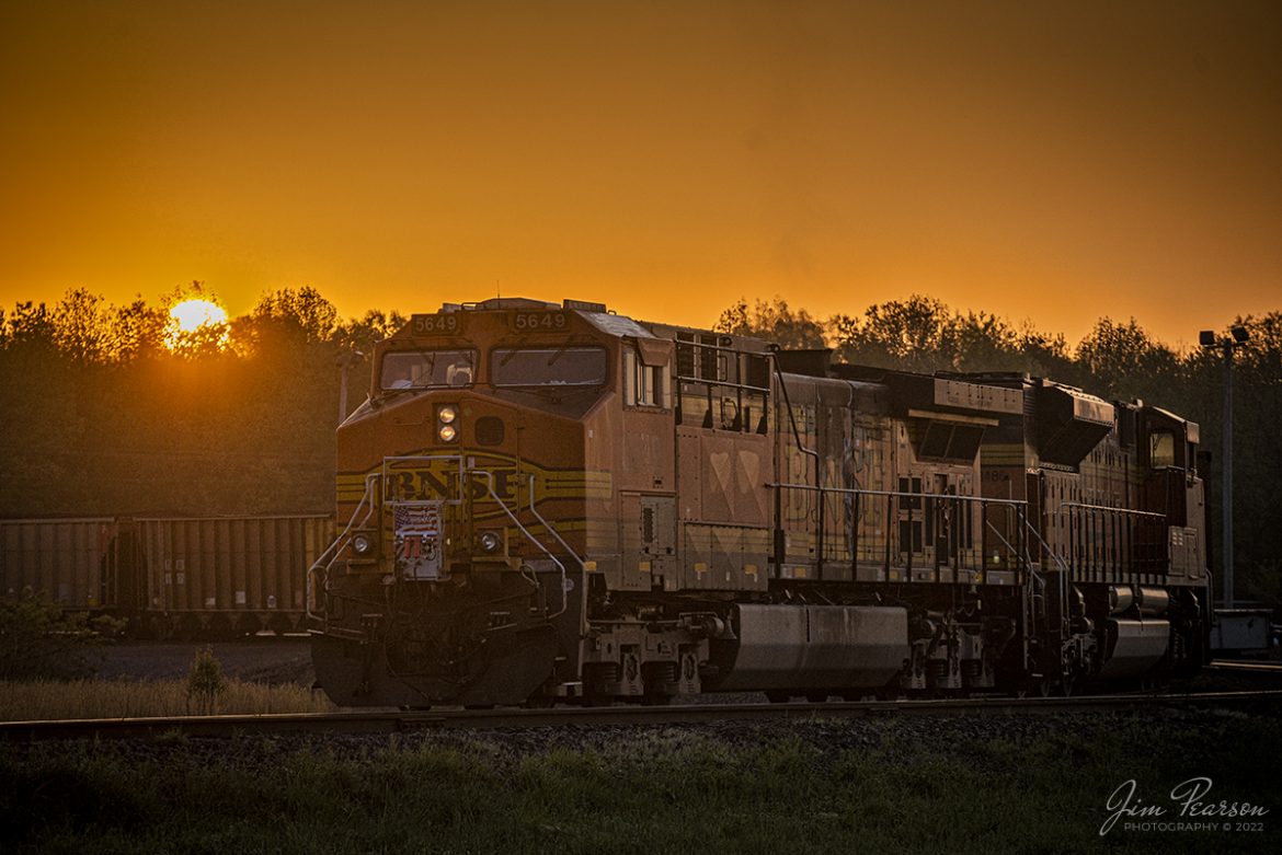 BNSF 5649 sits on the inside loop at Calvert City Terminal, (CCT) as the sun rises over the train while another day of railroading begins on April 27th, 2022, on the Paducah and Louisville Railway (PAL). CCT is located at Calvert City, Kentucky off the Paducah and Louisville Railway line and receives coal daily from either BNSF, Union Pacific, CSX and of course PAL as well.

Tech Info: Nikon D800, RAW, Sigma 150-600 @ 170mm, f/5, 1/2500, ISO 320, -2 stops.

#trainphotography #railroadphotography #trains #railways #jimpearsonphotography #trainphotographer #railroadphotographer