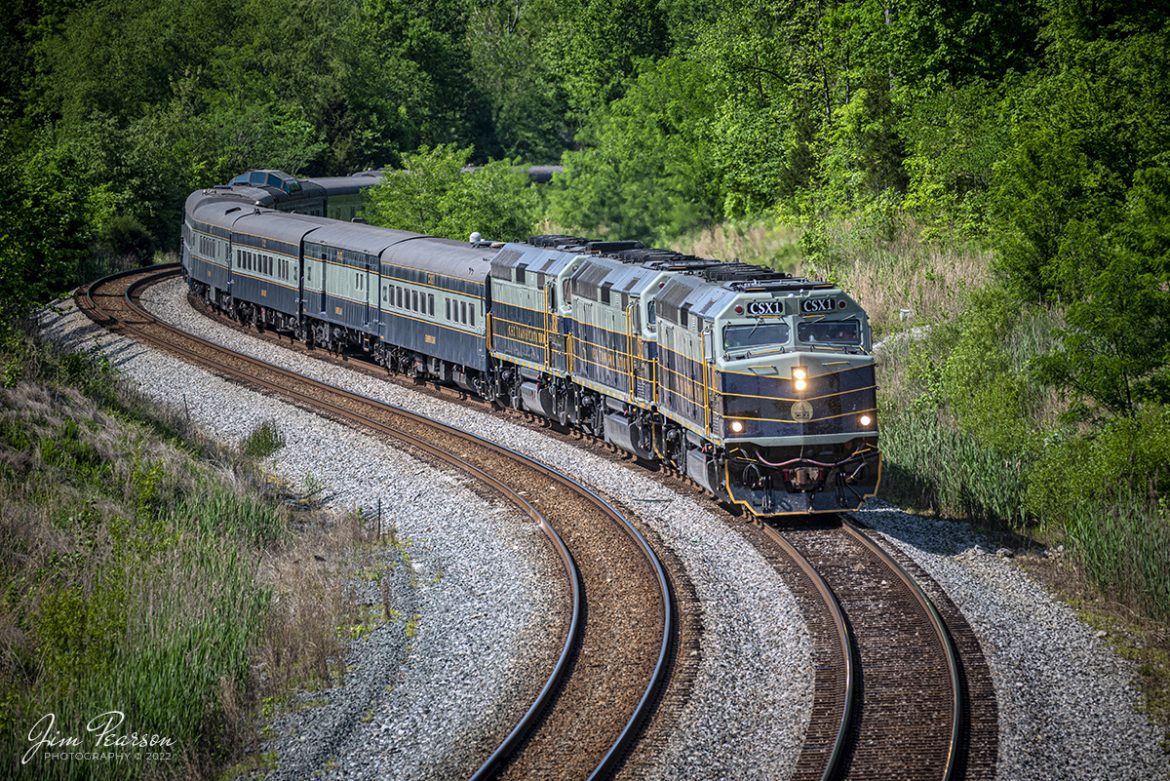 May 12, 2022 – CSX P001-09 Presidential Office Car passenger train heads through the S curve at Nortonville, Kentucky, with CSXT 1, 2 and 3 leading the way, southbound on the Henderson Subdivision.

CSX Transportation has repainted 3 of its executive fleet F40PH locomotives in a paint scheme inspired by predecessor Baltimore & Ohio and a fleet of cars to finish out the train set. The city of Baltimore chartered the railroad on Feb. 28, 1827, to build west to a suitable point on the Ohio River. Ground was broken on July 4, 1828, at Carrollton, Md. By 1929 the railroad operated 5,658 miles of track and had 2,364 locomotives. In the 1970s the B&O became part of Chessie System and in the 1980s it became part of CSX.

Tech Info: Nikon D800, RAW, Sigma 150-600 @ 220mm, f/5.3, 1/2000, ISO 560.

#trainphotography #railroadphotography #trains #railways #jimpearsonphotography #trainphotographer #railroadphotographer