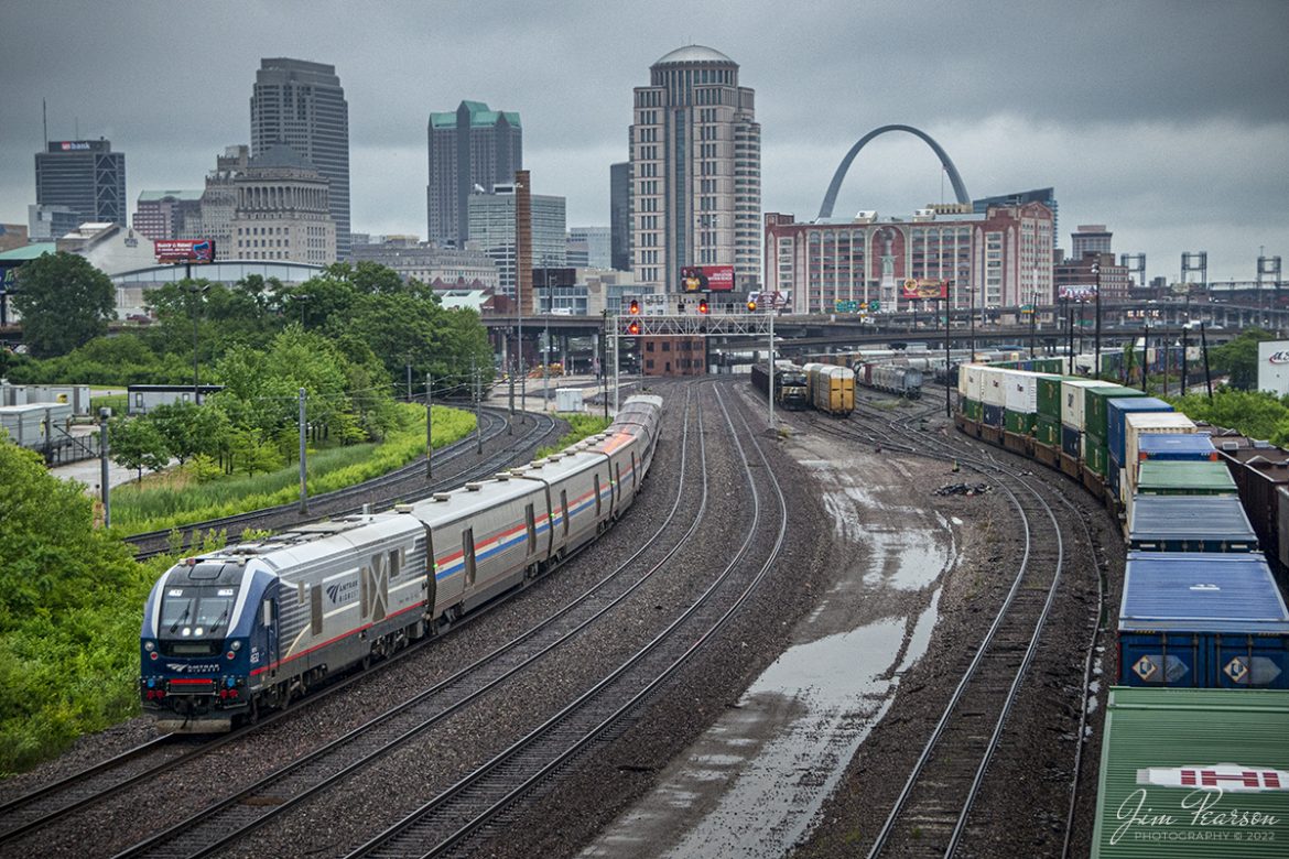Amtrak 4632 leads train 313, Missouri River Runner, as pulls west to Kansas City, MO, out of the 12th Street Yard on the TRRA Merchants Subdivision after departing the Gateway Transportation Center in downtown St. Louis Missouri on May 21st, 2022. On the right we have a Union Pacific intermodal snaking its way east on the UP Jefferson City Subdivision.

According to Wikipedia: The Gateway Multimodal Transportation Center, also known as Gateway Station, is a rail and bus terminal station in downtown St. Louis, Missouri. Opened in 2008 and operating 24 hours a day, it serves Amtrak trains and Greyhound and Burlington Trailways interstate buses. Missouri's largest rail transportation station.

Tech Info: Nikon D800, RAW, Sigma 18-300 @ 50mm, f/4.8, 1/500, ISO 1400.

#trainphotography #railroadphotography #trains #railways #jimpearsonphotography #trainphotographer #railroadphotographer