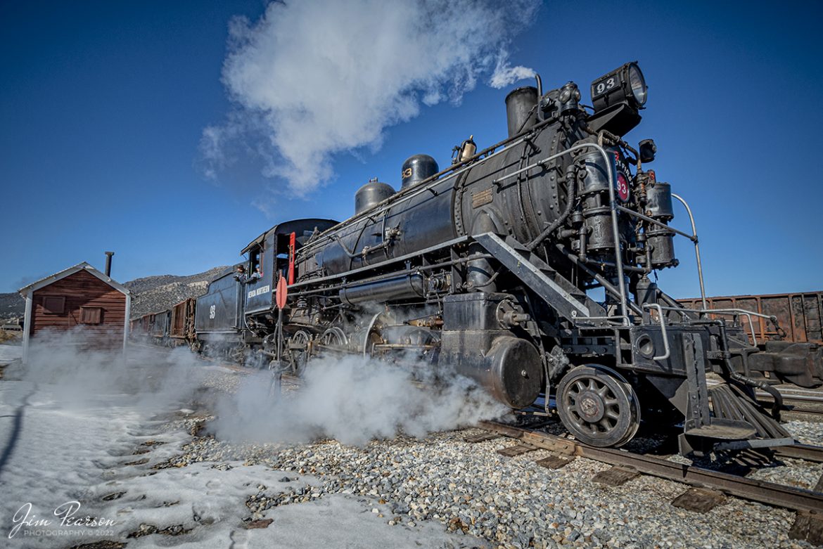 Nevada Northern Railway steam locomotive #93 pulls past the line shack in the ore yards at Ely, Nevada during the final day of their 3-day Winter Photography Charter on February 13th, 2022.

Locomotive #93 is a 2-8-0 that was built by the American Locomotive Company in January of 1909 at a cost of $17,610. It was the last steam locomotive to retire from original revenue service on the Nevada Northern Railway in 1961 and was restored to service in 1993.

According to Wikipedia: The Nevada Northern Railway Museum is a railroad museum and heritage railroad located in Ely, Nevada and operated by a historic foundation dedicated to the preservation of the Nevada Northern Railway.

The museum is situated at the East Ely Yards, which are part of the Nevada Northern Railway. The site is listed on the United States National Register of Historic Places as the Nevada Northern Railway East Ely Yards and Shops and is also known as the "Nevada Northern Railway Complex". The rail yards were designated a National Historic Landmark District on September 27, 2006. The site was cited as one of the best-preserved early 20th-century railroad yards in the nation, and a key component in the growth of the region's copper mining industry. Developed in the first decade of the 20th century, it served passengers and freight until 1983, when the Kennecott Copper Company, its then-owner, donated the yard to a local non-profit for preservation. The property came complete with all the company records of the Nevada Northern from its inception.

Tech Info: Nikon D800, RAW, Nikon 10-24mm @ 10mm, f/5.6, 1/800, ISO 140.

#trainphotography #railroadphotography #trains #railways #jimpearsonphotography #trainphotographer #railroadphotographer #steamtrains #nevadanorthernrailway