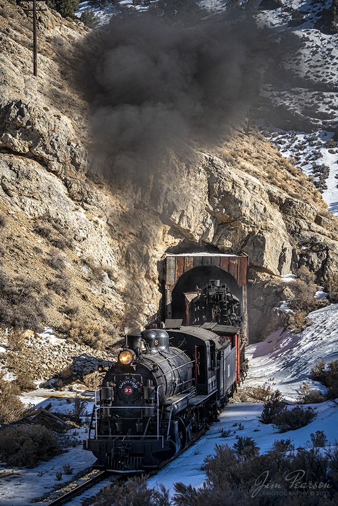 Nevada Northern Railway steam locomotive #93 pulls out of tunnel one as it heads southbound through Robinson Canyon with a work train from Ely, Nevada during the final day of their 3-day Winter Photography Charter on February 13th, 2022. The piece of equipment just exiting the tunnel is the railroads operational steam crane.

Locomotive #93 is a 2-8-0 that was built by the American Locomotive Company in January of 1909 at a cost of $17,610. It was the last steam locomotive to retire from original revenue service on the Nevada Northern Railway in 1961 and was restored to service in 1993.

According to Wikipedia: The Nevada Northern Railway Museum is a railroad museum and heritage railroad located in Ely, Nevada and operated by a historic foundation dedicated to the preservation of the Nevada Northern Railway.

The museum is situated at the East Ely Yards, which are part of the Nevada Northern Railway. The site is listed on the United States National Register of Historic Places as the Nevada Northern Railway East Ely Yards and Shops and is also known as the Nevada Northern Railway Complex. The rail yards were designated a National Historic Landmark District on September 27, 2006. The site was cited as one of the best-preserved early 20th-century railroad yards in the nation, and a key component in the growth of the region's copper mining industry. Developed in the first decade of the 20th century, it served passengers and freight until 1983, when the Kennecott Copper Company, its then-owner, donated the yard to a local non-profit for preservation. The property came complete with all the company records of the Nevada Northern from its inception.

Tech Info: Nikon D800, RAW, Nikon 70-300mm @ 90mm, f/4.5, 1/2000, ISO 400.

#trainphotography #railroadphotography #trains #railways #jimpearsonphotography #trainphotographer #railroadphotographer