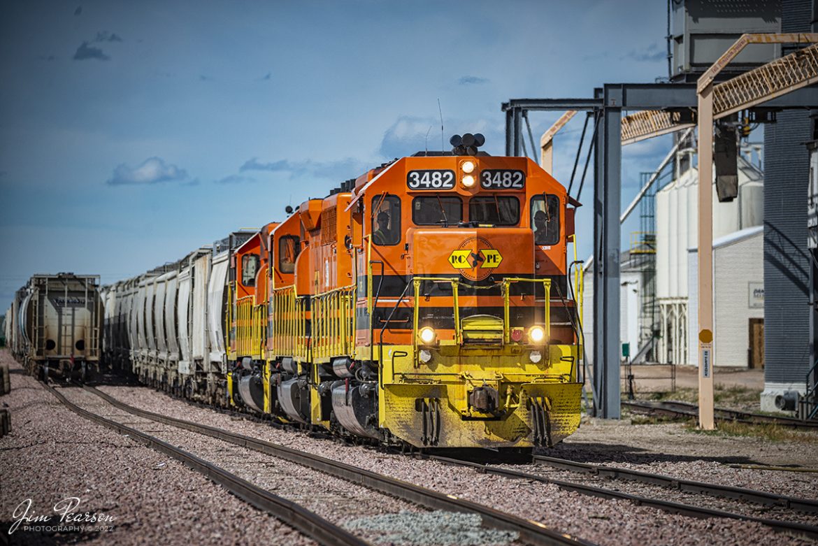 Rapid City, Pierre and Eastern Railroad (RCPE) 3482 leads a train westbound through downtown Wall, South Dakota on May 29th, 2022, as it passes its eastbound counterpoint at Dakota Mill and Grain.

According to Wikipedia: Rapid City, Pierre and Eastern Railroad (reporting mark RCPE) is a Class II railroad operating across South Dakota and southern Minnesota in the northern plains of the United States. Portions of the railroad also extend into Wyoming and Nebraska. It is owned and operated by Genesee & Wyoming.

The Genesee & Wyoming, a holding company of mostly shortline railroads, formed the Rapid City, Pierre and Eastern to acquire the western end of the former Dakota, Minnesota and Eastern Railroad (DM&E) rail line from the Canadian Pacific Railway (CPR). The acquisition was completed on May 30, 2014, for $210 million. Most of its employees came over from the DM&E.

Tech Info: Nikon D800, RAW, Sigma 150-600 @ 270mm, f/5.6, 1/2500, ISO 280.

#trainphotography #railroadphotography #trains #railways #jimpearsonphotography #trainphotographer #railroadphotographer #regionalrailroad