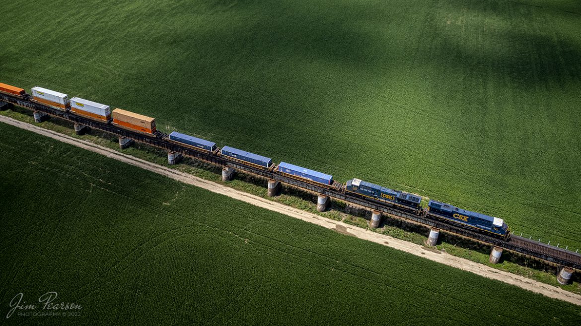 I love the way the light and shadows played across this scene of CSXT 834 and 3450 as they led CSX I028 northbound across the flood plain, headed north into Evansville, Indiana on July 14th, 2022. Add in the simplicity of the soybean fields surrounding the train, plus the angle I choose for the composition, gave me an image that I'm very happy with!

Tech Info: DJI Mavic Air 2S Drone, RAW, 22mm, f/2.8, 1/1000, ISO 100.

#trainphotography #railroadphotography #trains #railways #dronephotography #trainphotographer #railroadphotographer #jimpearsonphotography