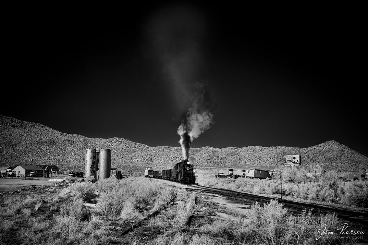 In this dramatic black and white Infrared photo Nevada Northern Railway engine 93 heads out of Ely, Nevada with an empty ore train under the control of engineer Jim Montague and fireman, as they pass a set of oil tanks, on February 12th, 2022.

They weren’t moving ore but was a part of the museums three-day Winter Photo Charter event that ran from February 11-13th, 2022. This was my first trip to the Nevada Northern and won’t be my last!


Locomotive #93 is a 2-8-0 that was built by the American Locomotive Company in January of 1909 at a cost of $17,610. It was the last steam locomotive to retire from original revenue service on the Nevada Northern Railway in 1961 and was restored back into service in 1993, according to the NNRY website.


According to Wikipedia: “The Nevada Northern Railway Museum is a railroad museum and heritage railroad located in Ely, Nevada and operated by a historic foundation dedicated to the preservation of the Nevada Northern Railway.


Tech Info: Fuji XT-1, RAW, Converted to 720nm B&W IR, Nikon 10-24 @ 24mm, f/4.5, 1/210, ISO 400.


#trainphotography #railroadphotography #trains #railways #jimpearsonphotography #infraredtrainphotography #infraredphotography #trainphotographer #railroadphotographer #steamtrains #nevadanorthernrailway