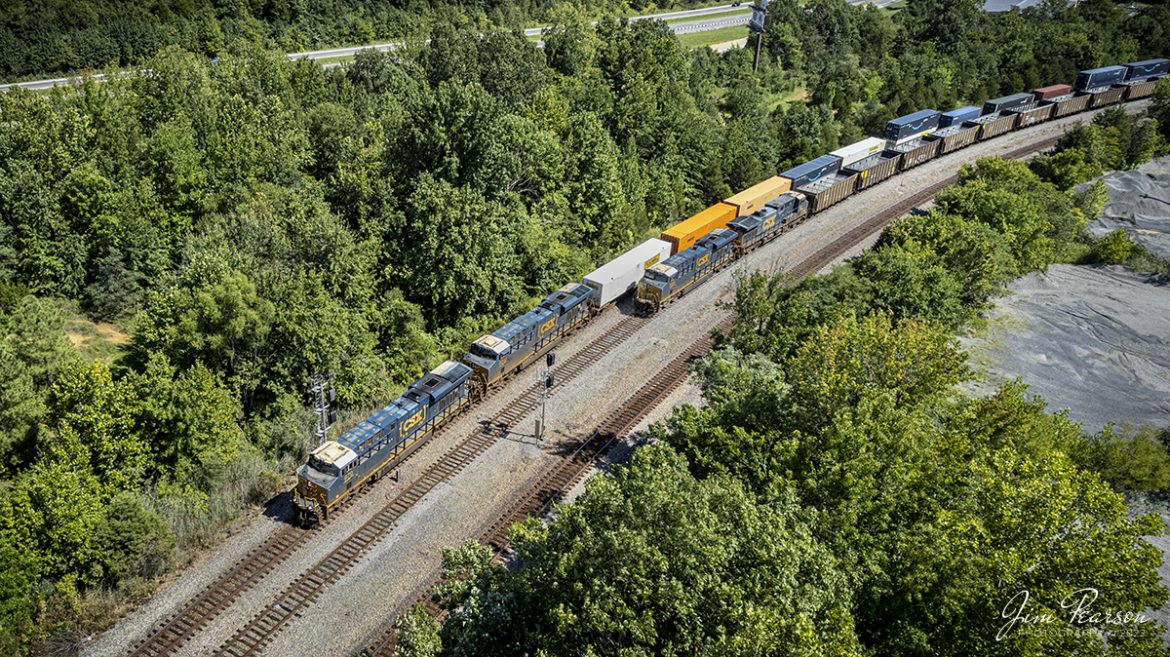CSX Intermodal I028 rolls past a empty coal train at Arklow in Madisonville, Kentucky as it heads north on the CSX Henderson Subdivision on August 30th, 2022.

Tech Info: DJI Mavic Air 2S Drone, RAW, 22mm, f/2.8, 1/1000, ISO 100.

#trainphotography #railroadphotography #trains #railways #dronephotography #trainphotographer #railroadphotographer #jimpearsonphotography