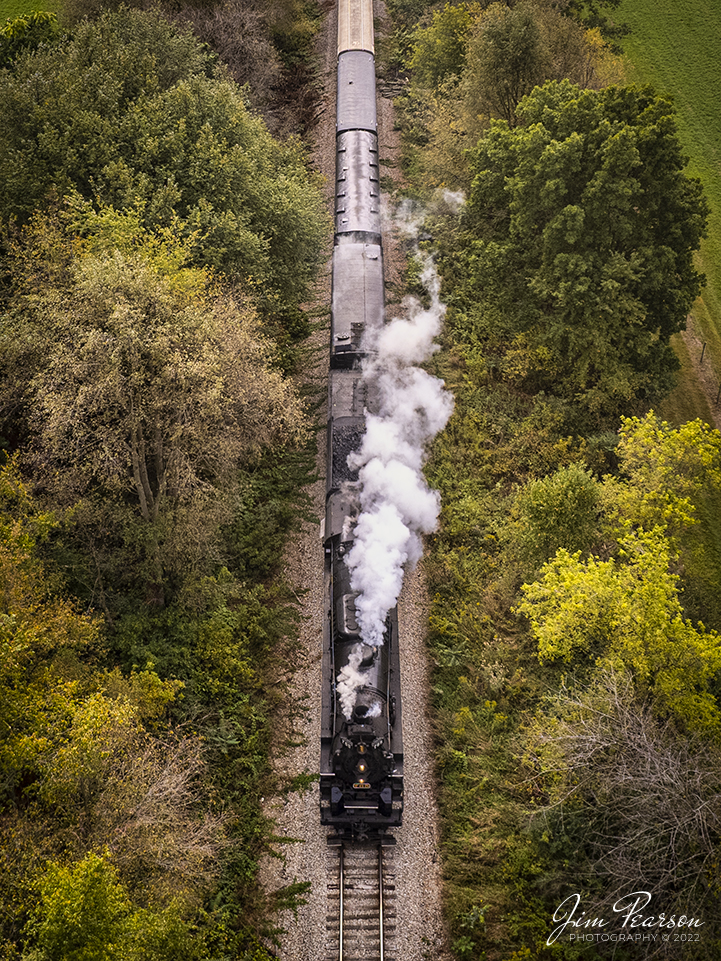 Nickel Plate Road (NKP) 765 leads the American History Train as they head through the countryside on the Indiana Northeastern Railroad to Angola, Indiana to pickup another load of passengers on September 24th, 2022.

NKP 765 was pulling the American History Train between Pleasant Lake from Angola, Indiana during the annual American History Days Festival. It took guests back to the 1940s for a living history experience. The passengers then got a 45-minute layover at Pleasant Lake where they visited with WWII reenactors, listened to live music and much more.

According to Wikipedia: Nickel Plate Road 765 is a class "S-2" 2-8-4 "Berkshire" type steam locomotive built for the New York, Chicago & St. Louis Railroad, commonly referred to as the "Nickel Plate Road".

No. 765 continues to operate in mainline excursion service and is owned and maintained by the Fort Wayne Railroad Historical Society and was also added to the National Register of Historic Places on September 12, 1996.

Tech Info: DJI Mavic Air 2S Drone, 22mm, f/2.8, 1/640, ISO 100.

#trainphotography #railroadphotography #trains #railways #dronephotography #trainphotographer #railroadphotographer #jimpearsonphotography #nkp765 #steamtrain