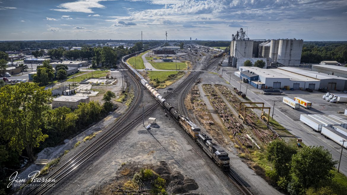 Norfolk Southern 1160 leads a northbound freight as it crosses over the diamond at the NS East Wayne Yard on the NS Huntington District on September 24th, 2022, at New Haven, Indiana. The train would eventually set out cars at the East Wayne Yard before continuing their trip north toward Detroit, Michigan.

Tech Info: DJI Mavic Air 2S Drone, RAW, 22mm, f/2.8, 1/2500, ISO 100.

#trainphotography #railroadphotography #trains #railways #dronephotography #trainphotographer #railroadphotographer #jimpearsonphotography