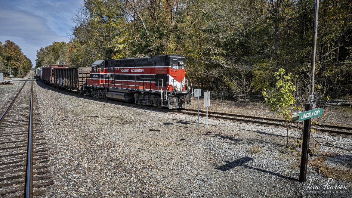 Hoosier Southern (HOS ) 468 leads the daily local as it heads north after picking up its interchange work from Norfolk Southern Railway at Lincoln City, Indiana on October 20th, 2022.

The railroad originally consisted of a 22.3-mile line between the Indiana communities of Cannelton and Santa Claus that the Port Authority purchased from Norfolk Southern in 1991. The line had been unused since the mid-1980s and Norfolk Southern was considering abandonment prior to the Port Authority's (PCPA) purchase.

PCPA's goal in obtaining and putting the Hoosier Southern line back into service was (and is) to attract new industry to Perry County. When Waupaca Foundry announced plans to build a facility just north of Tell City in 1995, the Port Authority undertook construction of a spur to that site. In 1996, an additional 2.4 miles of trackage between Santa Claus and Lincoln City was added to the HOS system. This trackage was also purchased from Norfolk Southern.

Combined with the Tell City River Port on the Ohio River at Tell City, the Hoosier Southern provides multimodal transportation to serve the needs of businesses in both Perry and Spencer counties.

Though the Hoosier Southern is no longer part of the Norfolk Southern system, it interchanges with the NS system at Lincoln City. NS gives HOS customers a direct connection to much of the eastern United States, with lines to such centers of commerce as Kansas City, Missouri and Louisville, Kentucky.

Tech Info: DJI Mavic Air 2S Drone, RAW, 22mm, f/2.8, 1/1600, ISO 130.

#trainphotography #railroadphotography #trains #railways #dronephotography #trainphotographer #railroadphotographer #jimpearsonphotography #HoosierSouthernRailroad #indianarailroads #trainsfromtheair