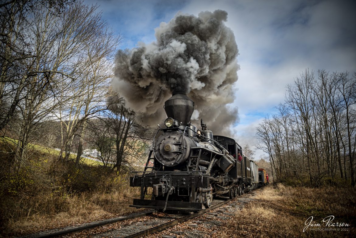 On November 4th, 2022, Meadow River Lumber Company steam locomotive, Heisler No. 6 passes through Nottingham, WV, during the Mountain Rail WV, Rail Heritage Photography Weekend. The event was held at the Durbin & Greenbrier Valley Railroad, Durbin, WV, and Cass Scenic Railroad, Cass, WV, from November 4-6th, 2022. Heisler No. 6 was built in 1929 and is a Class C-90 locomotive with 3 trucks.

According to Wikipedia: The Durbin and Greenbrier Valley Railroad (reporting mark DGVR) is a heritage and freight railroad in the U.S. states of Virginia and West Virginia. It operates the West Virginia State Rail Authority-owned Durbin Railroad and West Virginia Central Railroad (reporting mark WVC), as well as the Shenandoah Valley Railroad in Virginia.

Beginning in 2015, DGVR began operating the historic geared steam-powered Cass Scenic Railroad, which was previously operated by the West Virginia Division of Natural Resources as part of Cass Scenic Railroad State Park.

Tech Info: Nikon D800, RAW, Nikon 10-24mm @ 24mm, f/2.8, 1/1000, ISO 140.

#trainphotography #railroadphotography #trains #railways #trainphotographer #railroadphotographer #jimpearsonphotography #cassscenicrailway #durbinandgreenbriervalleyrr #steamtrains