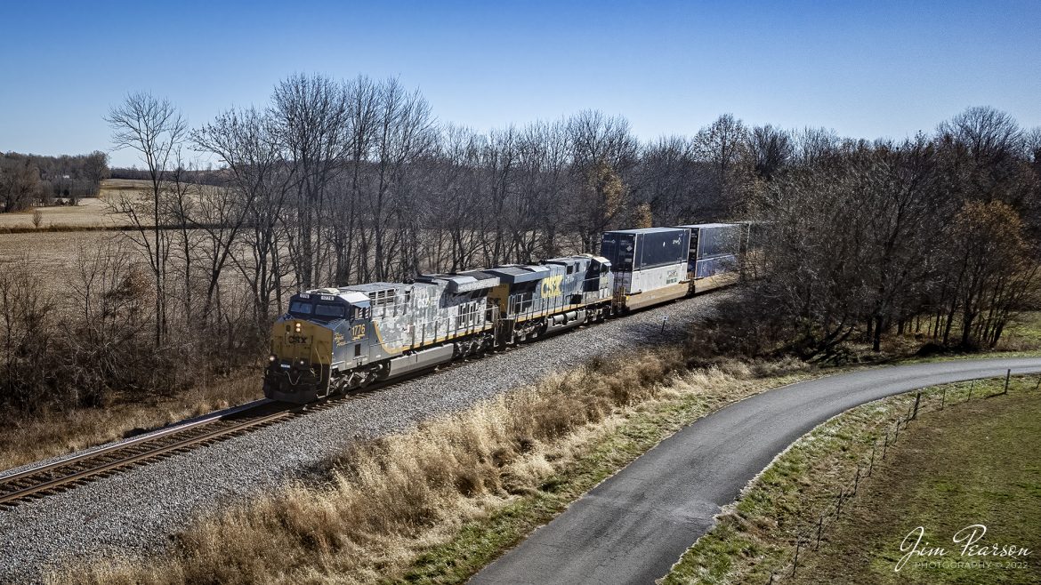 CSXT 1776, Honoring our Veterans Unit on November 30th, 2022, leads CSX I028 out of Slaughters, KY, on the Henderson Subdivision on November 30th, 2022.

On April 30, 2019, CSX unveiled locomotives 911 and this one, 1776. The two locomotives were created to honor the first responders and veterans. Another special unit, CSX 3194, was unveiled on August 22, 2019, in honor of the law enforcement.

Tech Info: DJI Mavic Air 2 Drone, RAW, 4.5mm (24mm equivalent lens) f/2.8, 1/2500, ISO 140.

#trainphotography #railroadphotography #trains #railways #dronephotography #trainphotographer #railroadphotographer #jimpearsonphotography #indianarailroads #trainsfromtheair