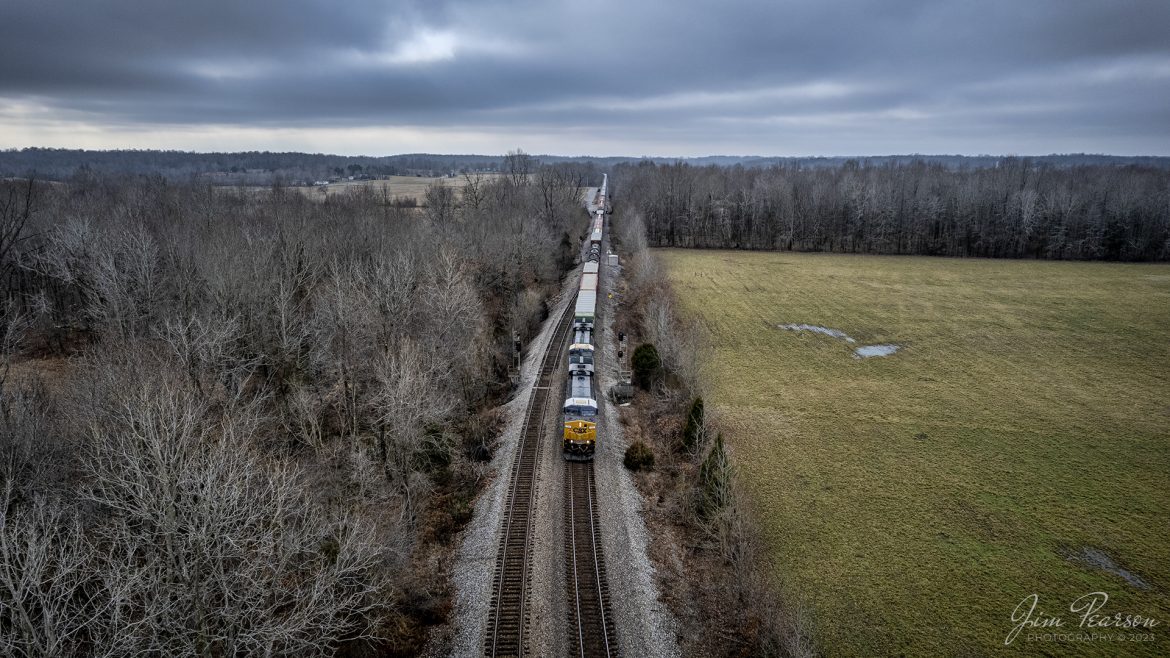 CSXT 783 and 3229 pass through the south end of the siding at Hanson, Kentucky on January 2nd, 2022, as the lead M648 north on the CSX Henderson Subdivision on a dreary overcast winter day.

The CSX Henderson Subdivision is part of the Nashville Division, and it runs between Nashville, Tennessee, and Evansville Indiana for a length of about 145.3 miles of mainline track. On average it sees around 20-30 trains a day, with four of them being hot intermodals.

Tech Info: DJI Mavic Air 2S Drone, RAW, 22mm, f/2.8, 1/1250, ISO 120.

#trainphotography #railroadphotography #trains #railways #dronephotography #trainphotographer #railroadphotographer #jimpearsonphotography #inrd #IndianaRailroad #RegionalRailroad #trainsfromtheair
