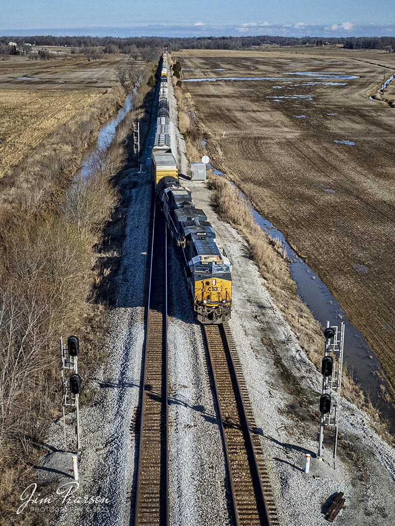CSX M513, takes the siding, at the north end of Slaughters, Ky for a meet as it heads south on the Henderson Subdivision on January 4th, 2023.

Tech Info: DJI Mavic Air 2S Drone, 22mm, f/2.8, 1/2500, ISO 150.

#trainphotography #railroadphotography #trains #railways #dronephotography #trainphotographer #railroadphotographer #jimpearsonphotography #csxhendersonsubdivision #trainsfromtheair #kentuckytrains