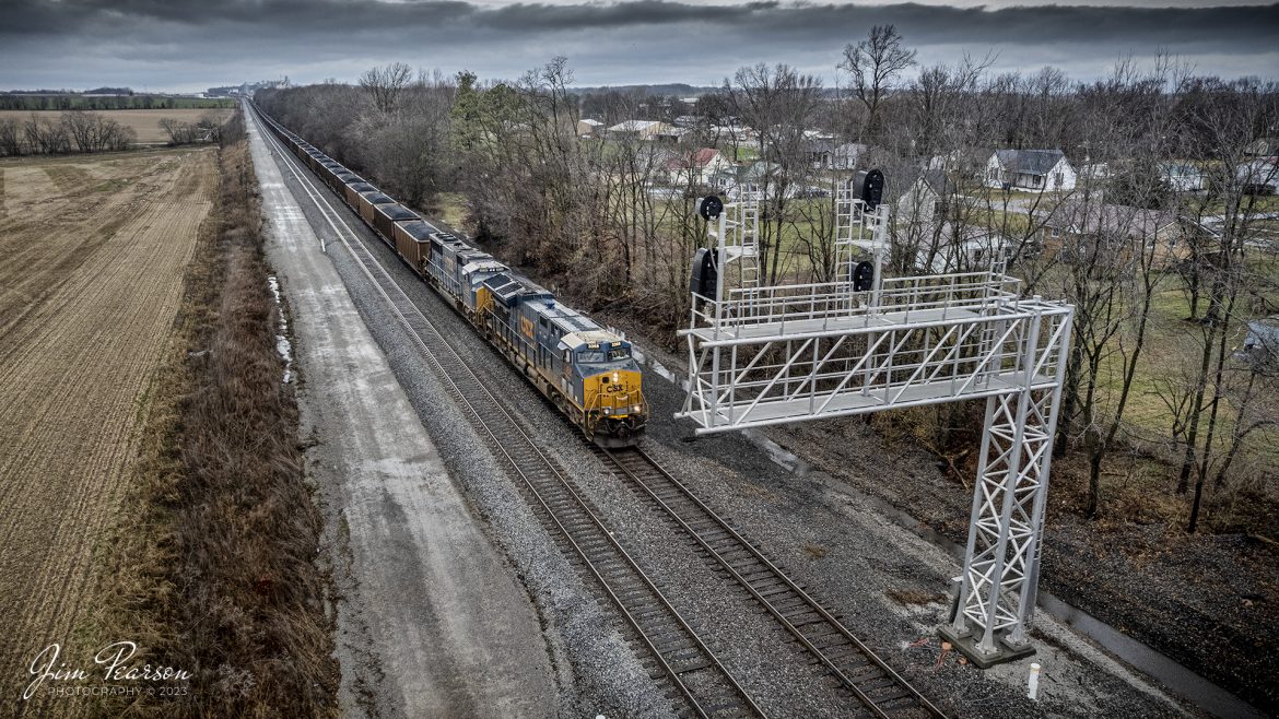 CSXT 3368 and 4538 head up a very long loaded coal train, C015, as it approaches Pembroke, Kentucky on January 12th, 2022, on the CSX Henderson Subdivision out of Casky Yard at Hopkinsville, Ky. The coal on this train comes from White Oak Mine on the Evansville Western Railway in Indiana and runs back to the Seminole Electric Seminole Generating Station at Bostwick, FL.

Tech Info: DJI Mavic Air 2S Drone, 22mm, f/2.8, 1/320, ISO 110.

#trainphotography #railroadphotography #trains #railways #dronephotography #trainphotographer #railroadphotographer #jimpearsonphotography #csxhendersonsubdivision #trainsfromtheair #kentuckytrains